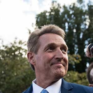 WASHINGTON, DC - OCTOBER 24:  Sen. Jeff Flake (R-AZ) and his wife Cheryl Flake leave the U.S. Capitol as they are trailed by reporters, October 24, 2017 in Washington, DC. Flake announced that he will not be seeking re-election and he will leave the Senate after his term ends in 14 months. (Photo by Drew Angerer/Getty Images)