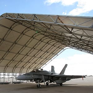 EL CENTRO, CA - NOVEMBER 4:  CF-18 Hornet fighter jets belonging to the Canadian 410 'Couger' Squadron are seen under shelters on the tarmac at Naval Air Facility (NAF) El Centro on November 4, 2009 near El Centro, California. The annual Canadian fighter pilot courses in the US train approximately 20-22 Canadian fighter pilots based in 4 Wing - Cold Lake, Alberta. The seven month long courses comprised of academics, simulator flights and flying missions in the southern California desert. The Canadian military courses are held in California for the better weather and the large nu,ber of bombing ranges and target sets in the region.  (Photo by David McNew/Getty Images)