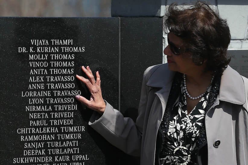TORONTO, ON- APRIL 16  -  Shirley Sequeira-Travasso touches the names of her brother and Sister-in-law and their two children who died in the plane bombing. Indian Prime Minister Narendra Modi and Prime Minister Stephen Harper  greeted families of the victims of Flight 182 near the monument after laying wreaths during a visit to the Air India Flight 182 monument at Humber Bay East Park in Toronto.  April 16, 2015. Air India Flight 182 flying on the Montreal, CanadaLondon, UK Delhi, India route on June  23, 1985, when a bomb destroyed the Boeing 747 over the Atlantic Ocean near Ireland.        (Steve Russell/Toronto Star via Getty Images)