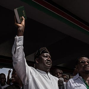 NAIROBI, KENYA - JANUARY 30: Opposition presidential candidate Raila Odinga takes an oath as president during a mock 'swearing-in' ceremony on January 30, 2018 at Uhuru Park in Nairobi, Kenya. The opposition held the ceremony to protest the results of the controversial 2017 elections, which lead to current President Uhuru Kenyatta being named to a second term. (Photo by Andrew Renneisen/Getty Images)