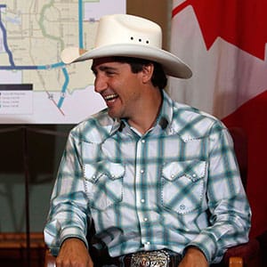 Prime Minister Justin Trudeau, right, speaks with Alberta Premier Rachel Notley during his visit to the Calgary Stampede, in Calgary on Friday, July 15, 2016. THE CANADIAN PRESS/Jeff McIntosh