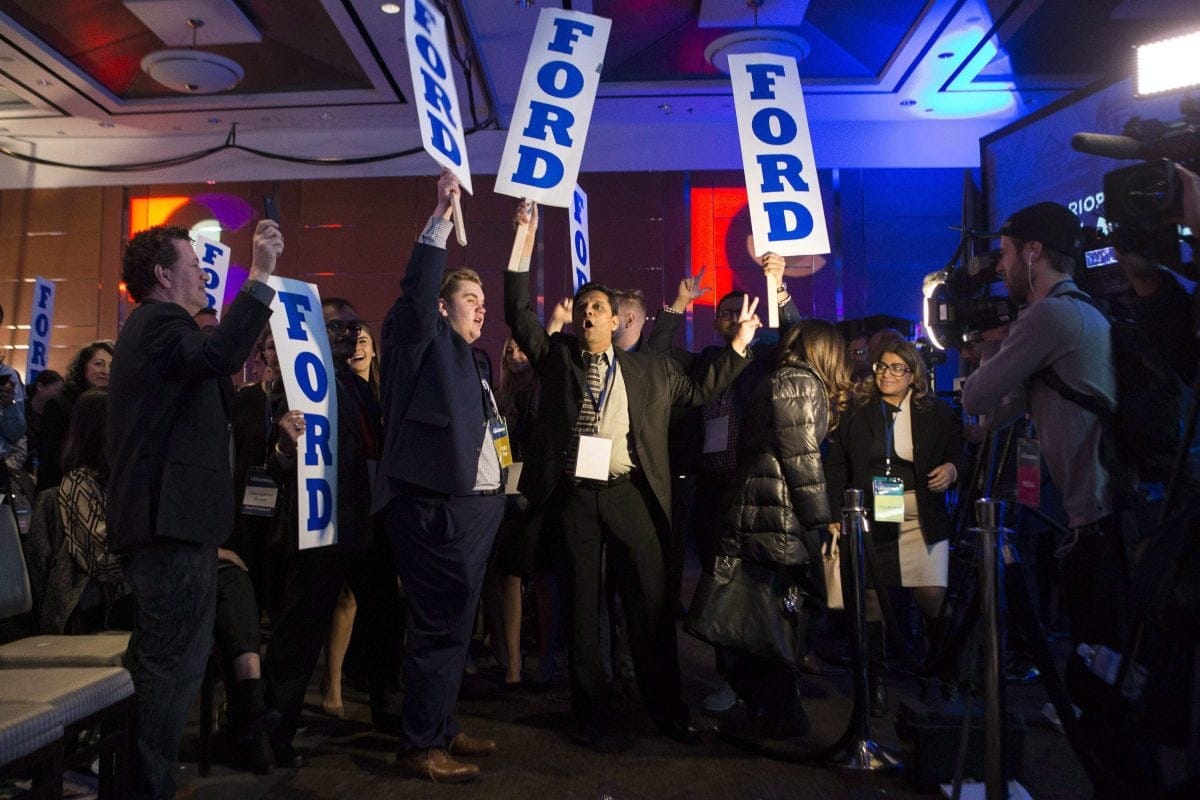 Doug Ford supporters rally during the delay in the Ontario PC Leadership announcement in Markham, Ont., on Saturday, March 10, 2018. THE CANADIAN PRESS/Chris Young