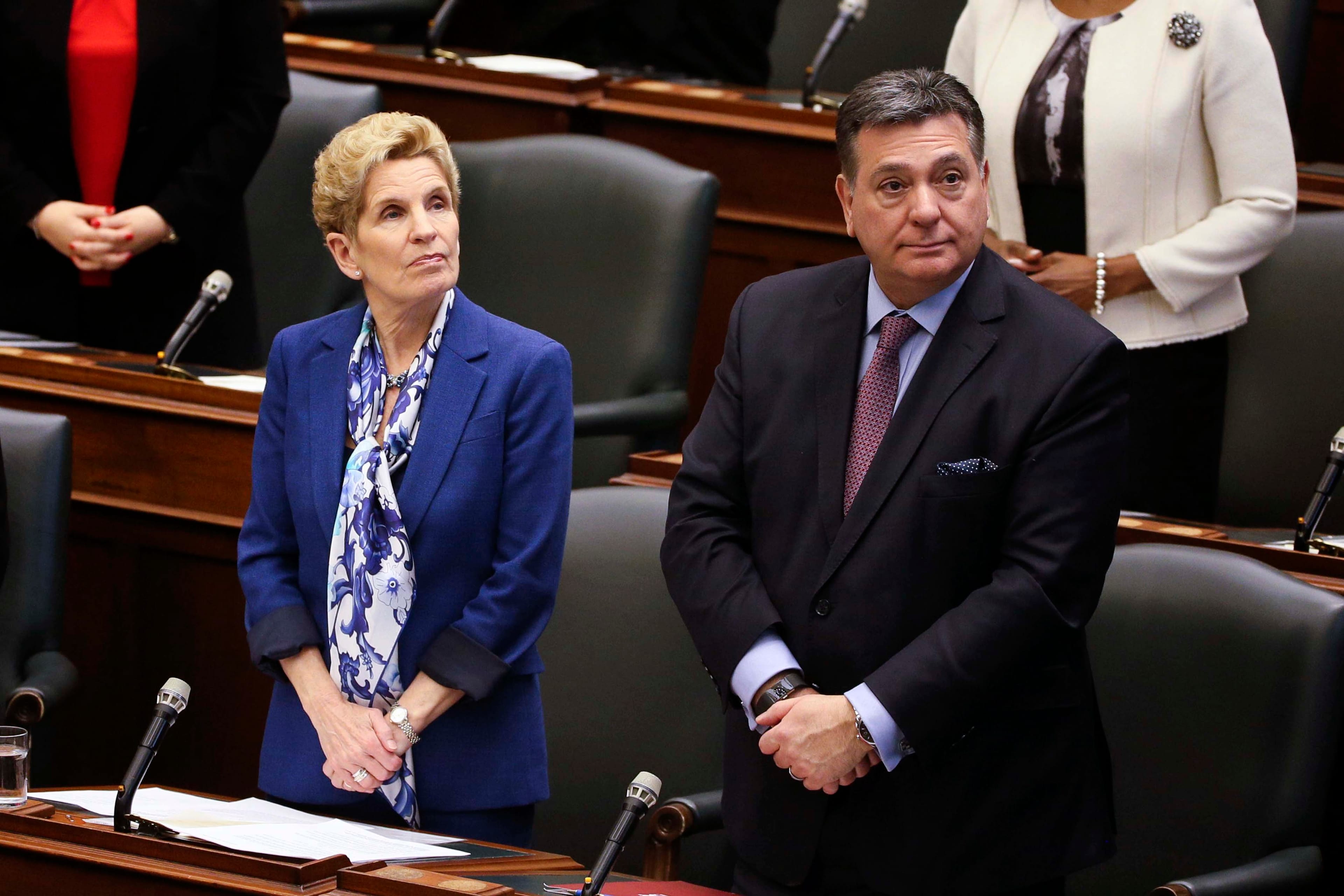 Ontario Premier Kathleen Wynne, left, and Finance Minister Charles Sousa on March 19, 2018.        (Andrew Francis Wallace/Toronto Star via Getty Images)