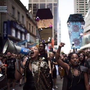 People from the Black Lives Matter lead the annual Pride Parade, in Toronto on Sunday, July 3, 2016. THE CANADIAN PRESS/Mark Blinch