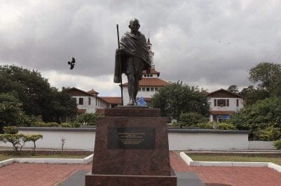 FILE-In this Thursday, Sept. 22, 2016 file photo, a statue of Indian independence leader Mohandas Gandhi in Accra, Ghana,  Ghana has expressed its intention to remove a statue of Indian independence leader Mohandas Gandhi from a university in the capital, citing a controversy over what critics call his Äúracist identity.Äù (AP Photo/Christian Thompson, File)