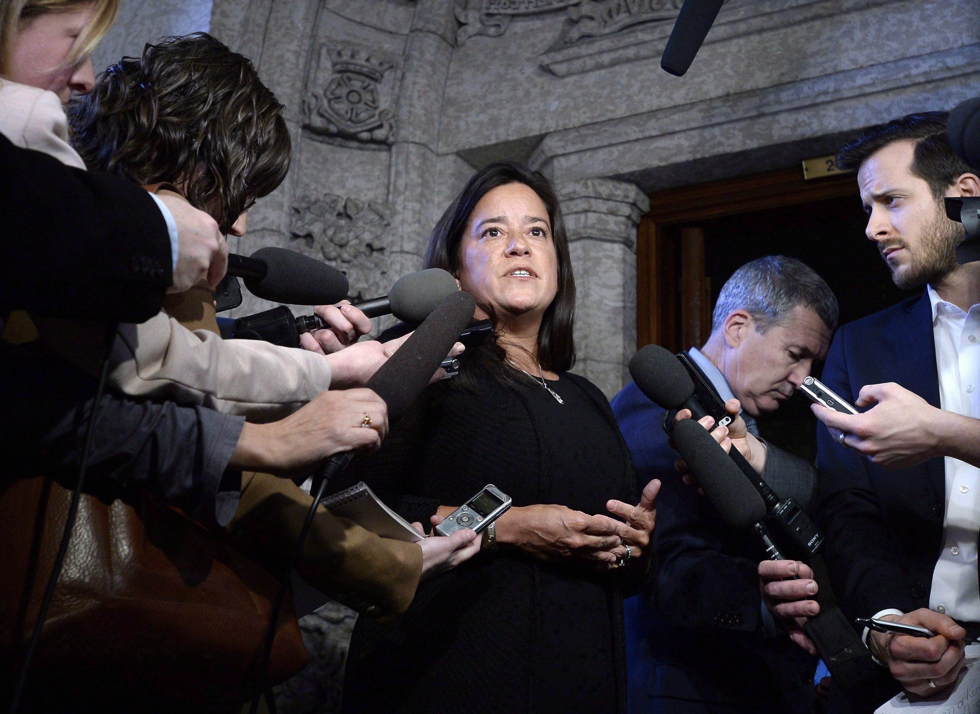 Minister of Justice and Attorney General of Canada Jody Wilson-Raybould speaks to reporters in the Foyer of the House of Commons on Parliament Hill in Ottawa on Feb. 12, 2018. (THE CANADIAN PRESS/Justin Tang)