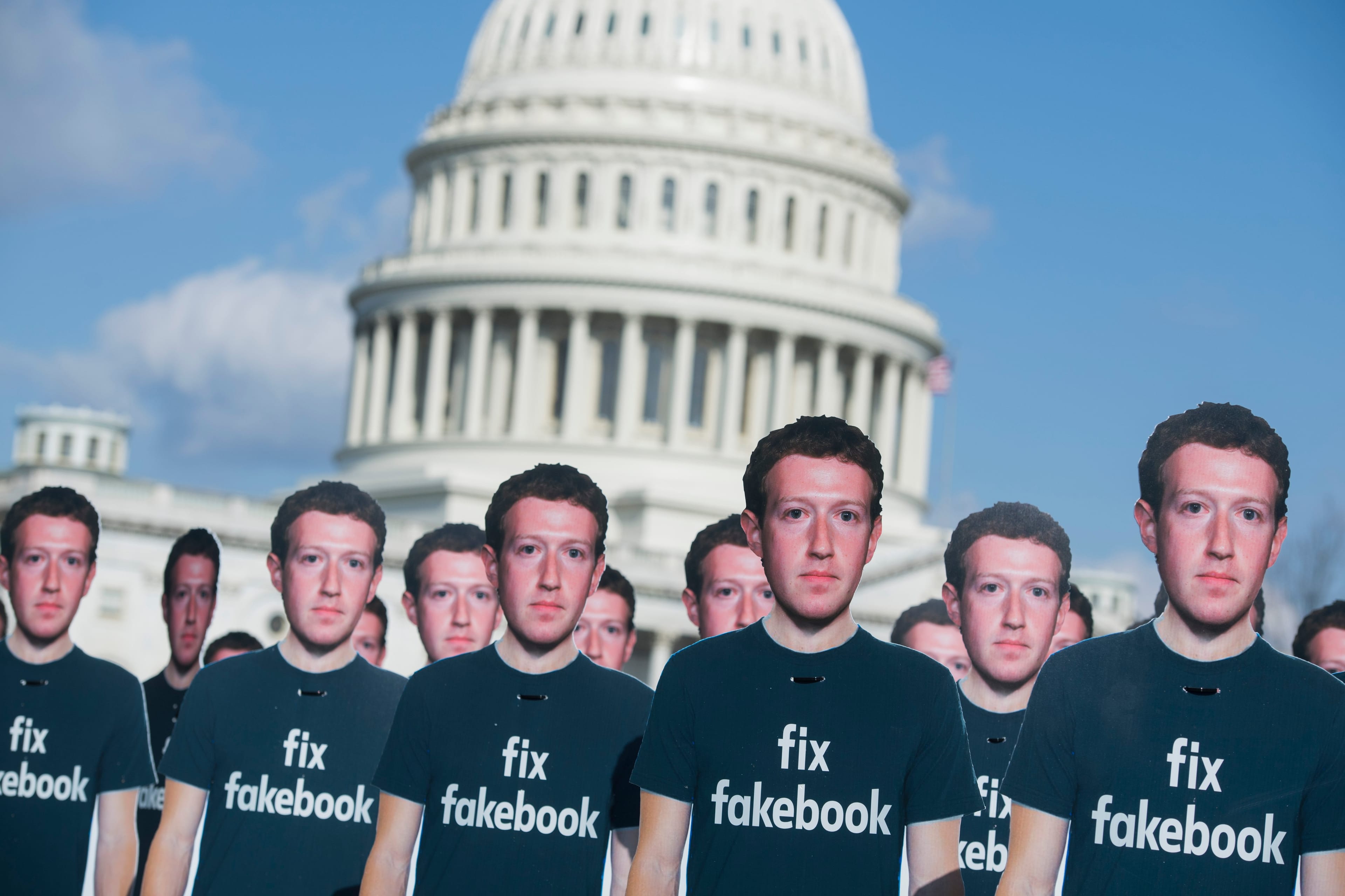 UNITED STATES - APRIL 10: Cutouts of Facebook CEO Mark Zuckerberg appear on the east lawn of the Capitol ahead of his testimony before a joint hearing of the Senate Judiciary and Commerce Committees on the protection of user data on April 10, 2018. Avaaz set up the display to call on Facebook to delete fake accounts. (Photo By Tom Williams/CQ Roll Call)