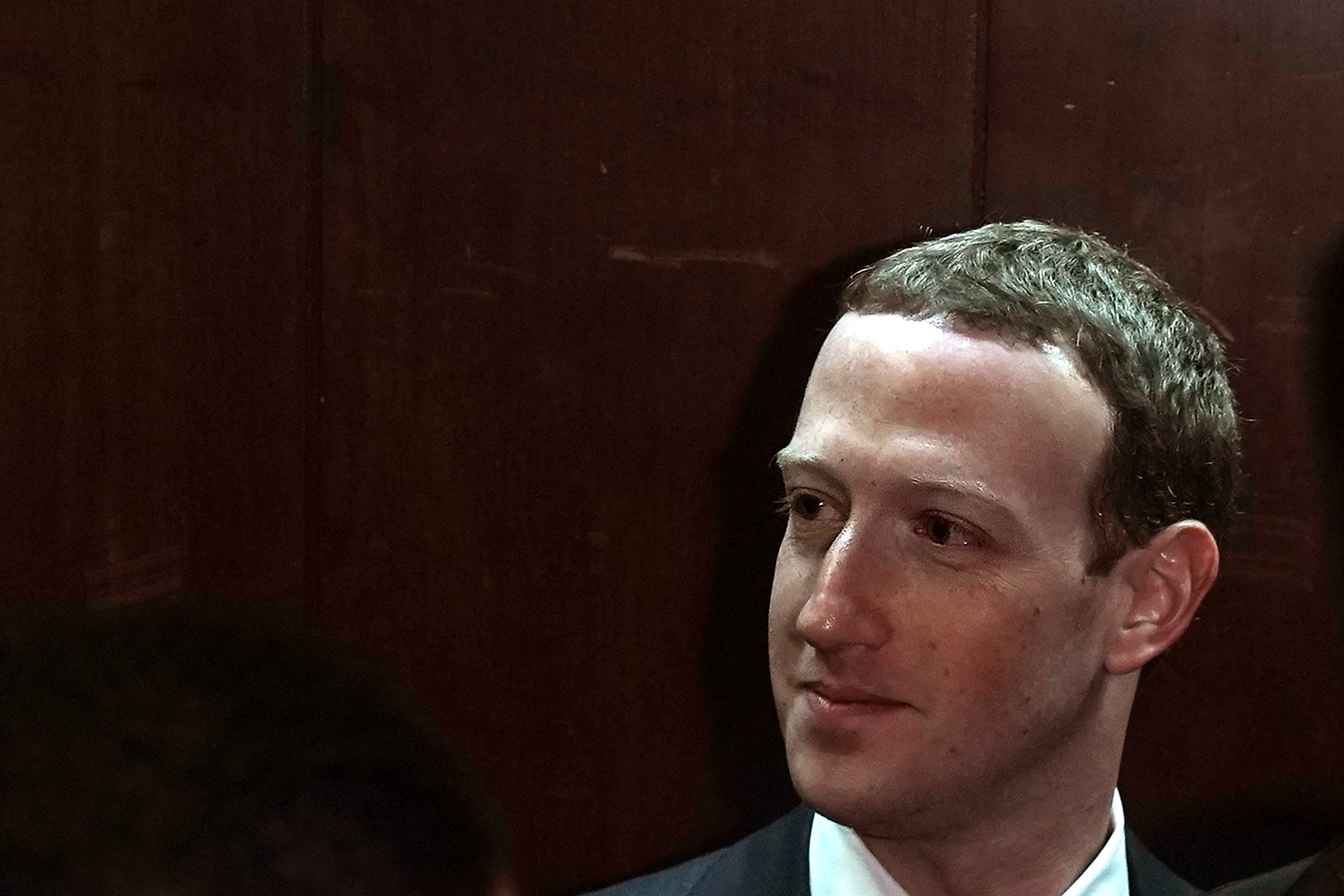 Facebook CEO Mark Zuckerberg leaves a meeting with U.S. Sen. Chuck Grassley (R-IA), chairman of Senate Judiciary Committee, April 9, 2018 on Capitol Hill in Washington.  (Photo by Alex Wong/Getty Images)