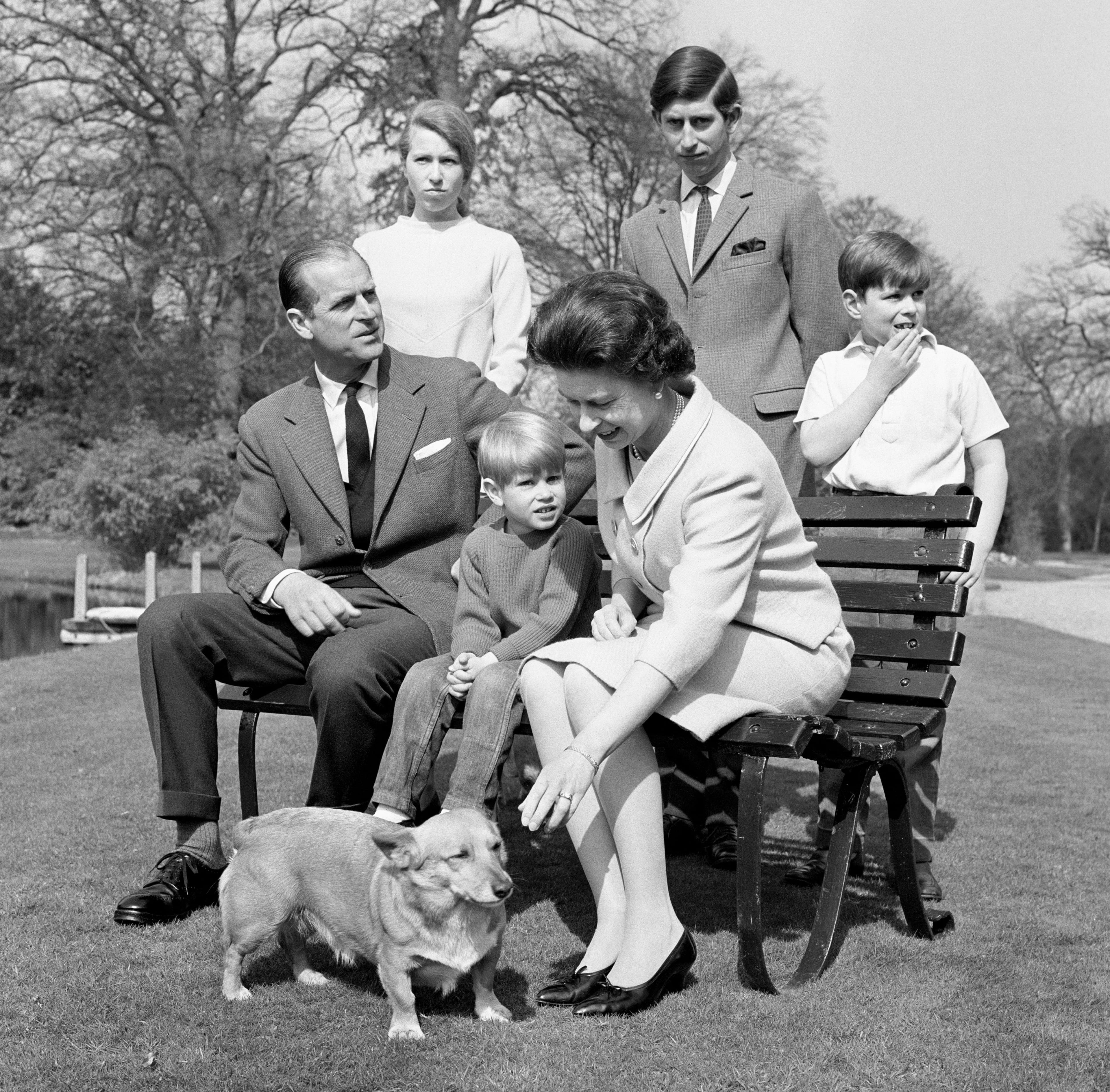 Queen Elizabeth II and the Royal Family pose in the gardens in 1962. (PA Images via Getty Images)