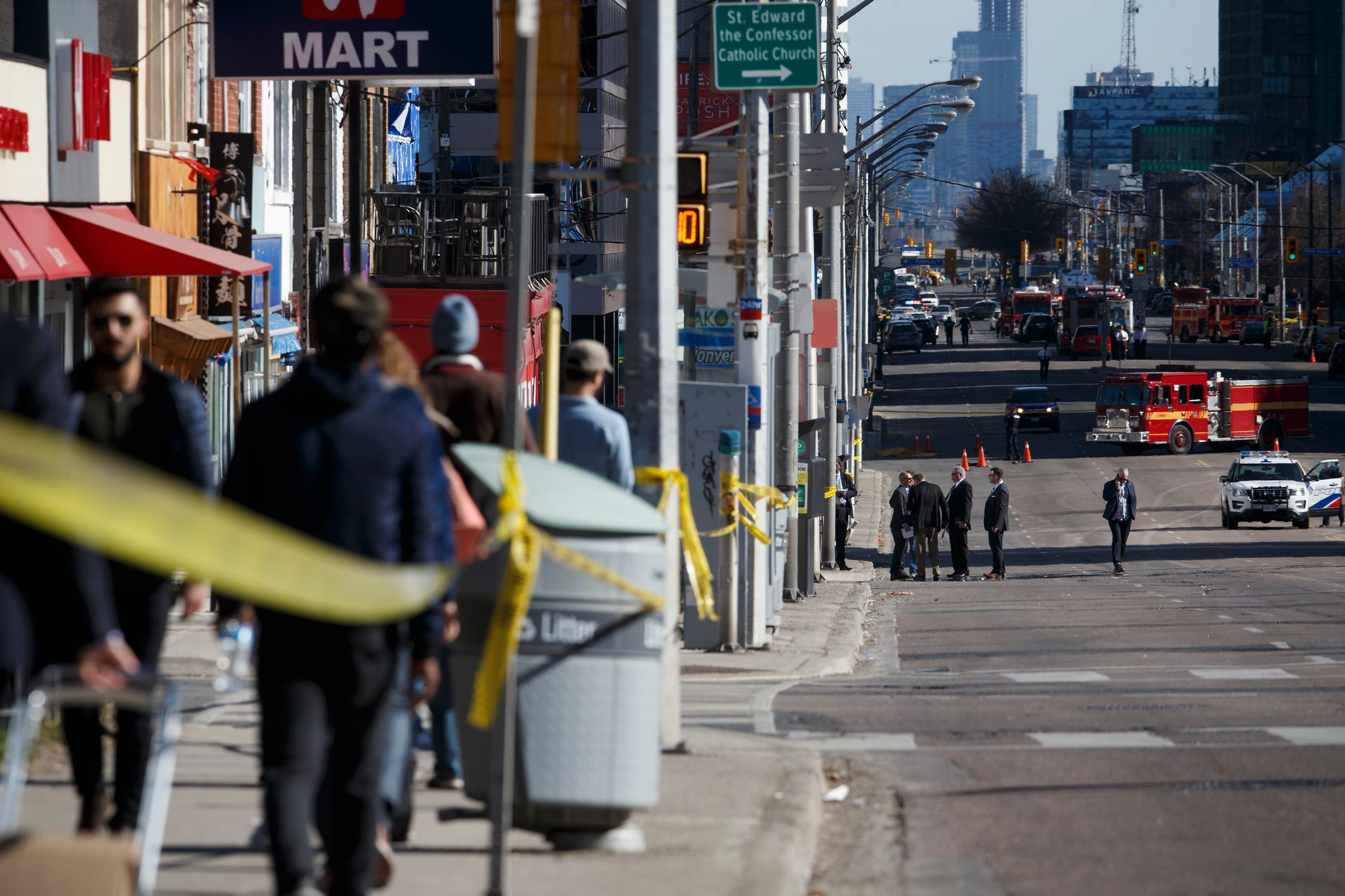 Police work the scene on Yonge St. at near Finch Ave., after a van plowed into pedestrians on April 23, 2018 in Toronto, Canada.  A suspect identified as Alek Minassian, 25, is in custody after a driver in a white rental van collided with multiple pedestrians killing nine and injuring at least 16. (Cole Burston/Getty Images)