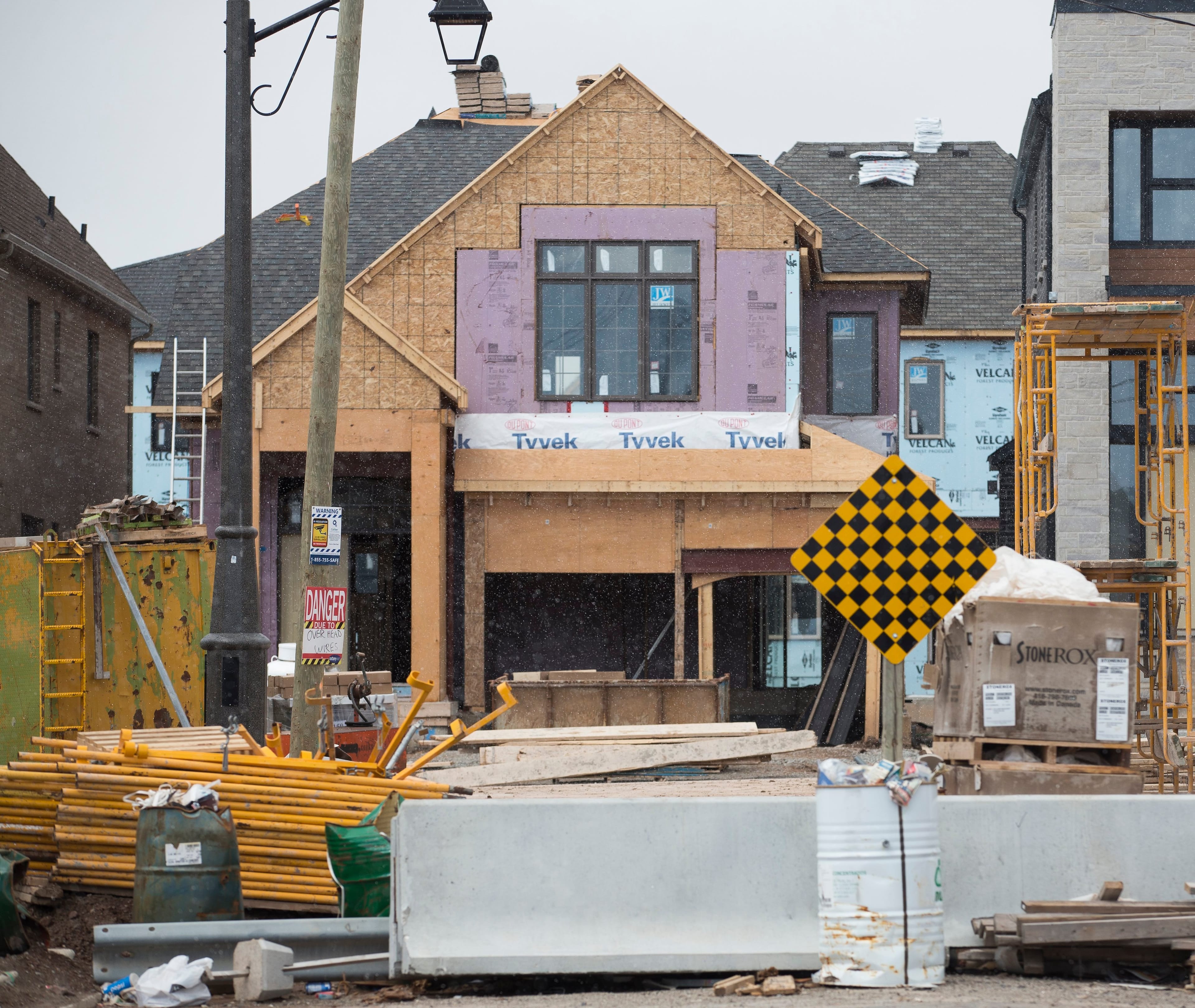 Some people who bought new builds in an Oakville, Ont., development are facing financial issues due to new mortgage criteria and the devaluation of the houses they bought a year ago. (Rick Madonik/Toronto Star via Getty Images)