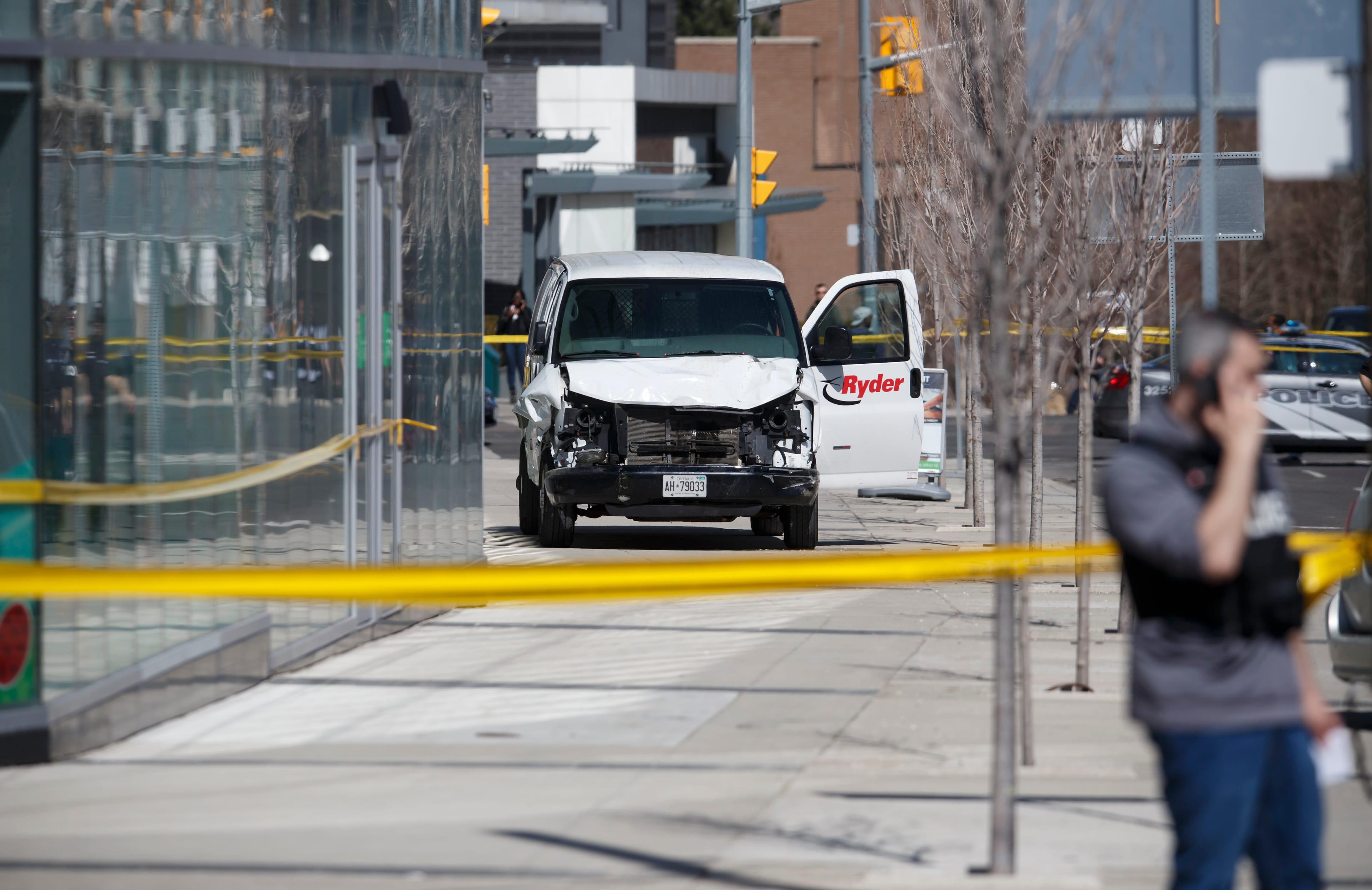 TORONTO, ON - APRIL 23:  Police inspect a van suspected of being involved in a collision injuring at least eight people at Yonge St. and Finch Ave. on April 23, 2018 in Toronto, Canada. A suspect is in custody after a white van collided with multiple pedestrians. (Photo by Cole Burston/Getty Images)