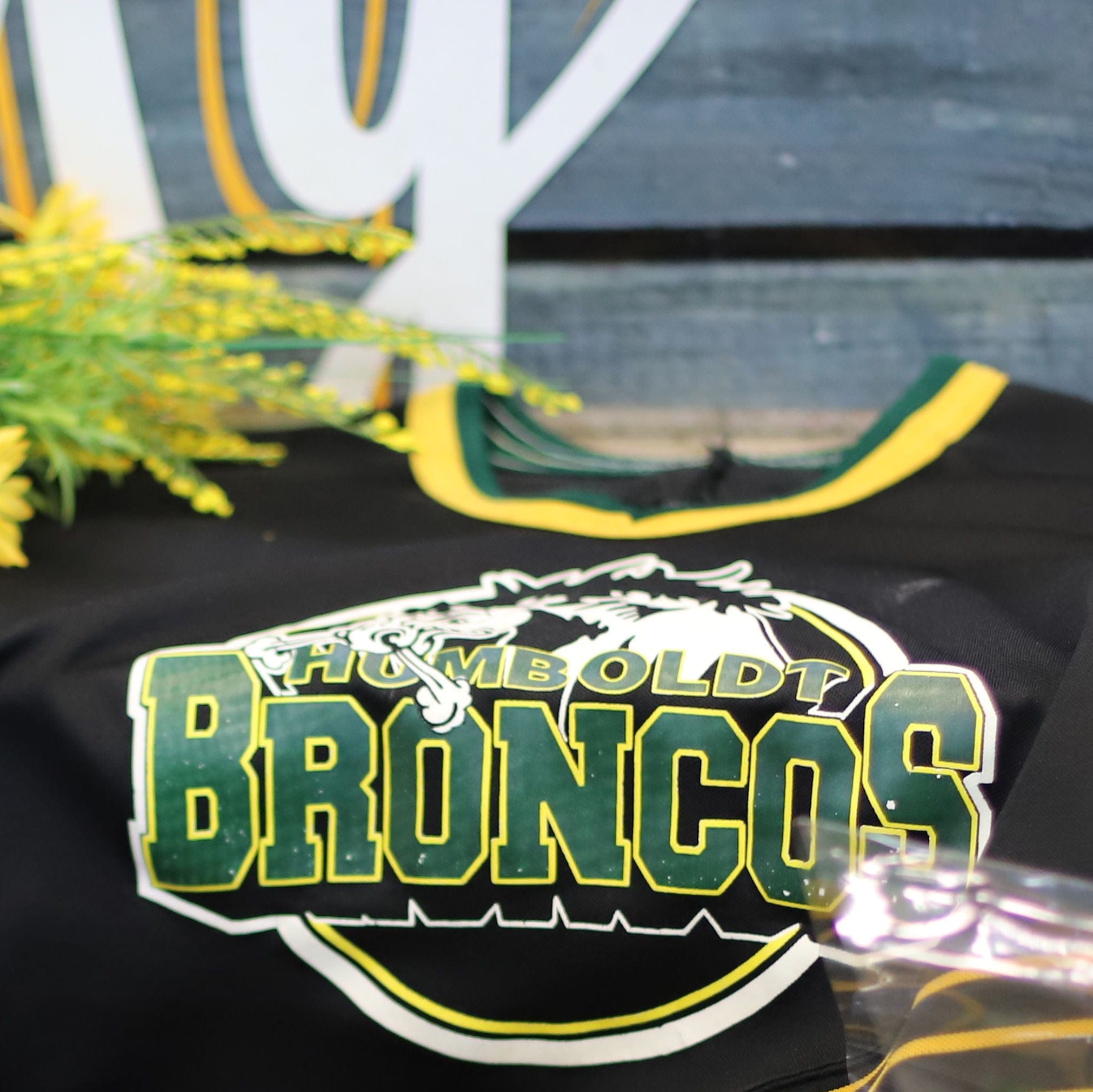 An ice hockey jersey is left in a makeshift memorial at the Humboldt Uniplex in Humboldt, Canada, on April 8, 2018. 
Canadian Prime Minister Justin Trudeau will attend a vigil late Sunday to honor the victims of a crash that killed 15 people, most of them members of a junior ice hockey team, his office said. The prayer vigil is expected to attract a large crowd in the tiny town of Humboldt, home to some 6,000 people.
 / AFP PHOTO / Kymber RAE        (Photo credit should read KYMBER RAE/AFP/Getty Images)