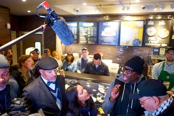 People protest at a Starbucks on April 15, 2018, in Philadelphia, Pennsylvania, after the police arrested two black men who had been waiting inside the shop.(Photo by Mark Makela/Getty Images)