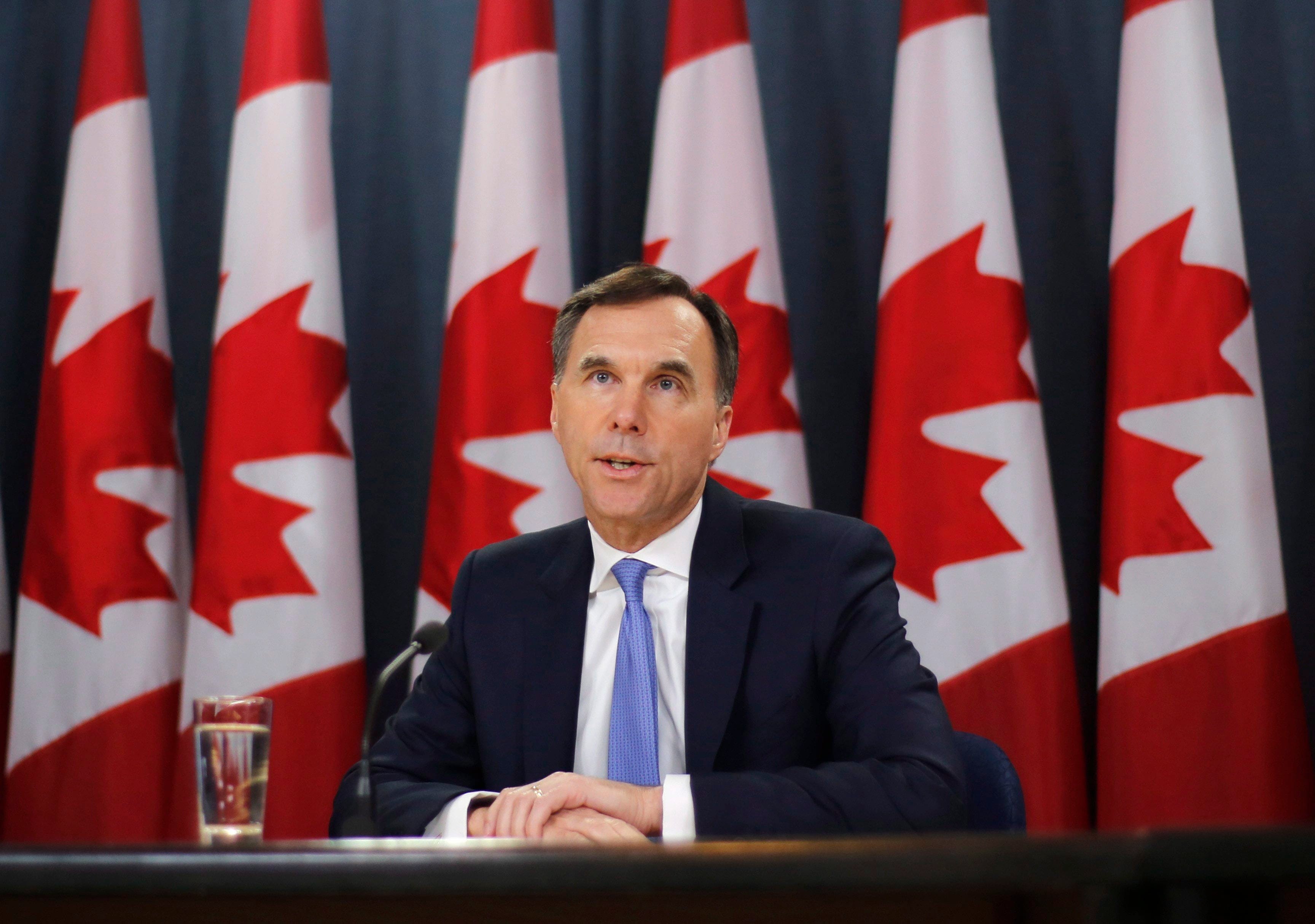 Finance Minister Bill Morneau speaks about the Trans Mountain Expansion project at a press conference in Ottawa on Wednesday, May 16, 2018. THE CANADIAN PRESS/ Patrick Doyle