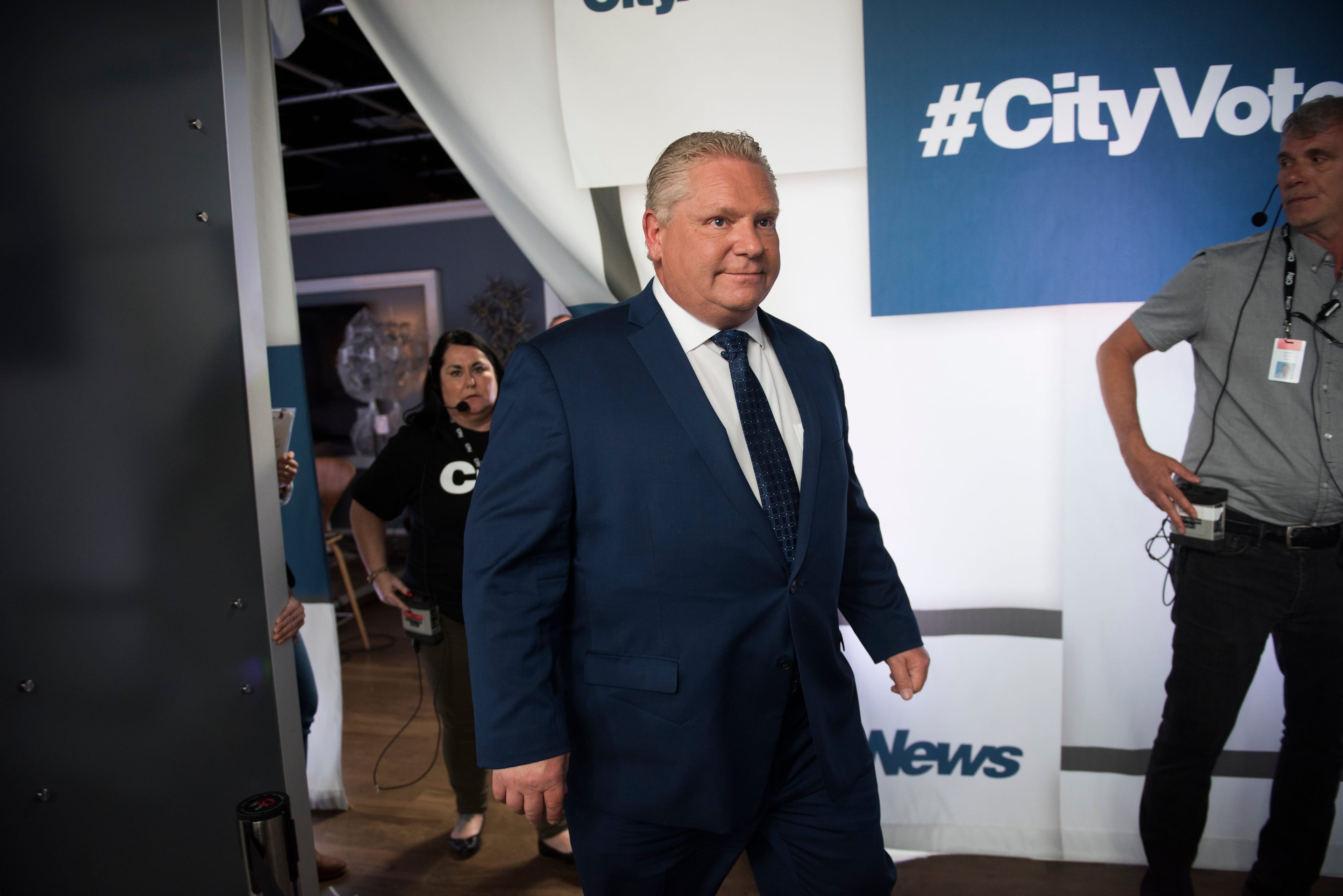 Doug Ford, leader of the Progressive Conservative Party of Ontario enters a scrum after the CityNews first televised debate ahead of this year's Ontario provincial election held at City studios on May 7, 2018 in Toronto. (Marta Iwanek for Maclean's)