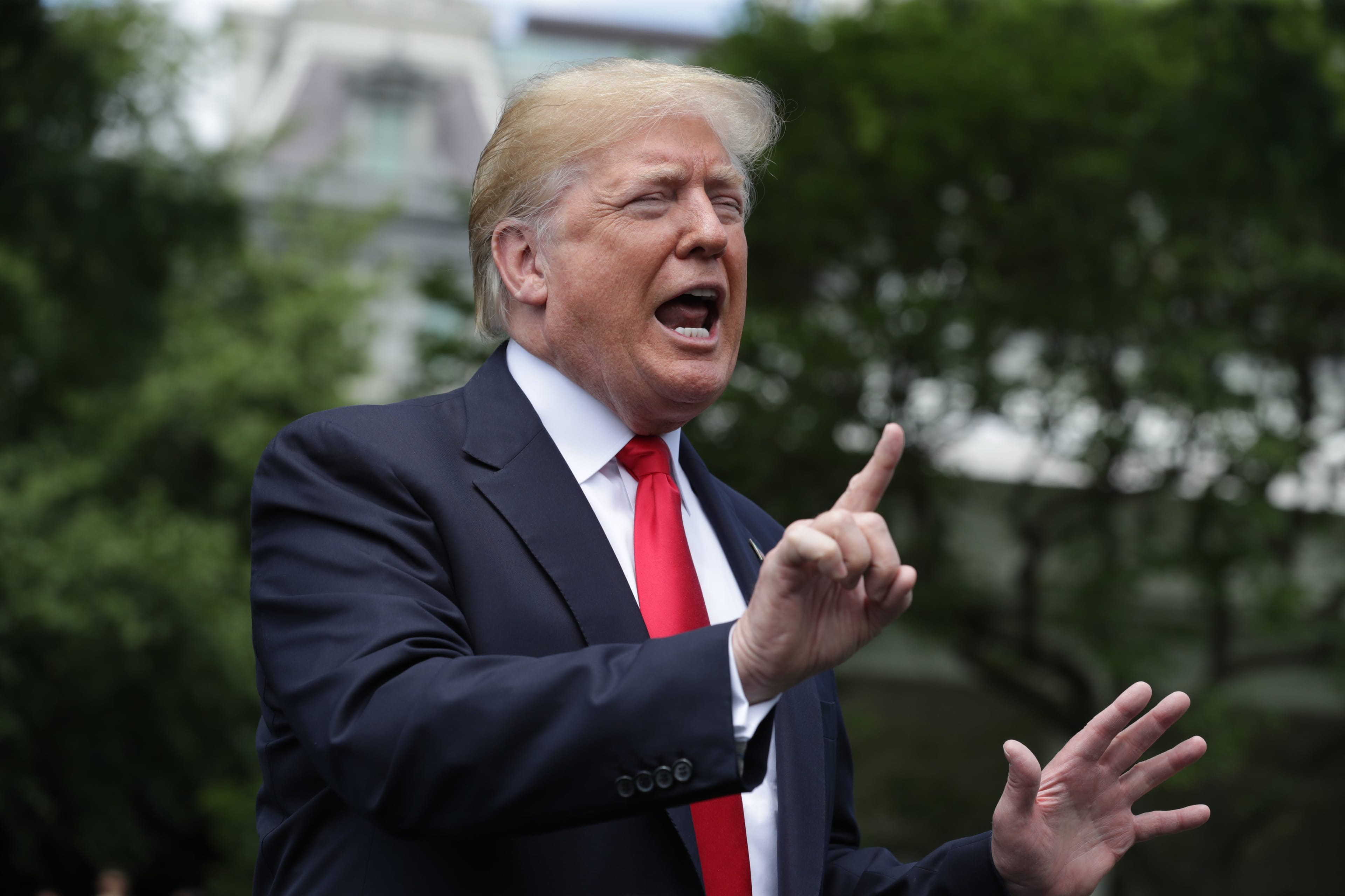 U.S. President Donald Trump speaking to media on South Lawn while leaving the White House on May 23, 2018 in Washington, DC. (Chip Somodevilla/Getty Images)
