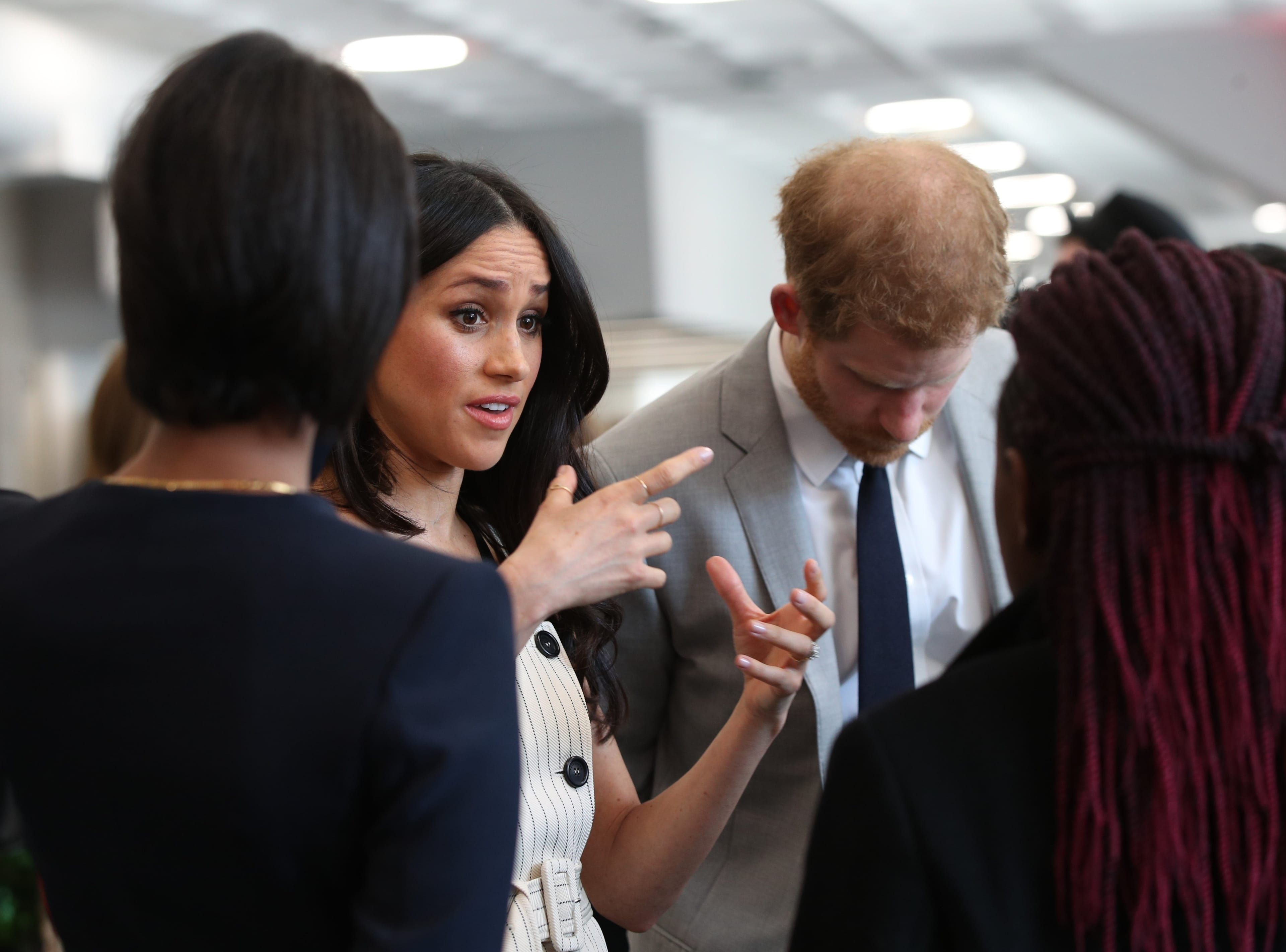 Meghan Markle speaks with delegates from the Commonwealth Youth Forum during the Commonwealth Heads of Government Meeting in London (Photo by Yui Mok - WPA Pool/Getty Images)