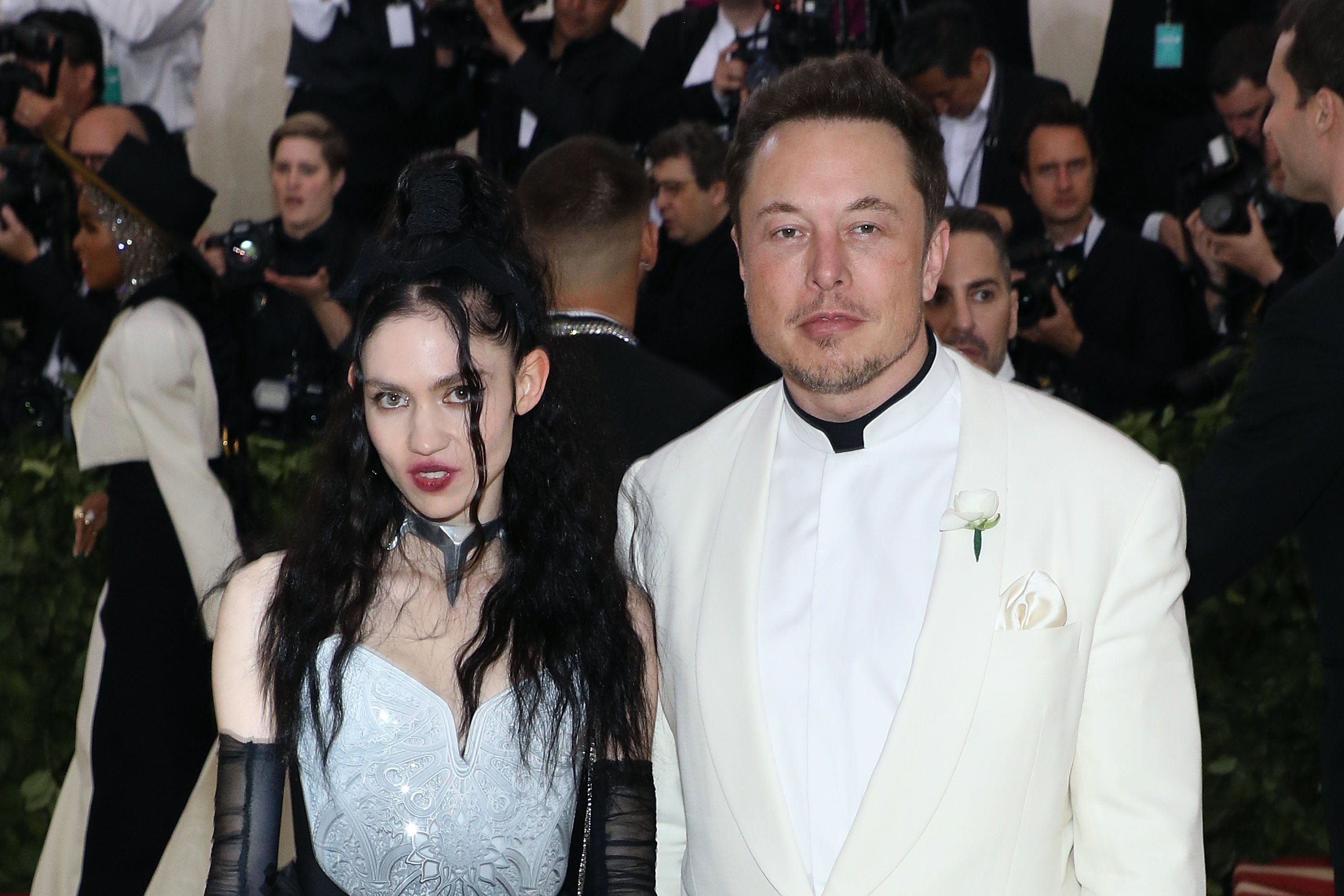 NEW YORK, NY - MAY 07:  Grimes and Elon Musk attend "Heavenly Bodies: Fashion &amp; the Catholic Imagination", the 2018 Costume Institute Benefit at Metropolitan Museum of Art on May 7, 2018 in New York City.  (Photo by Taylor Hill/Getty Images)