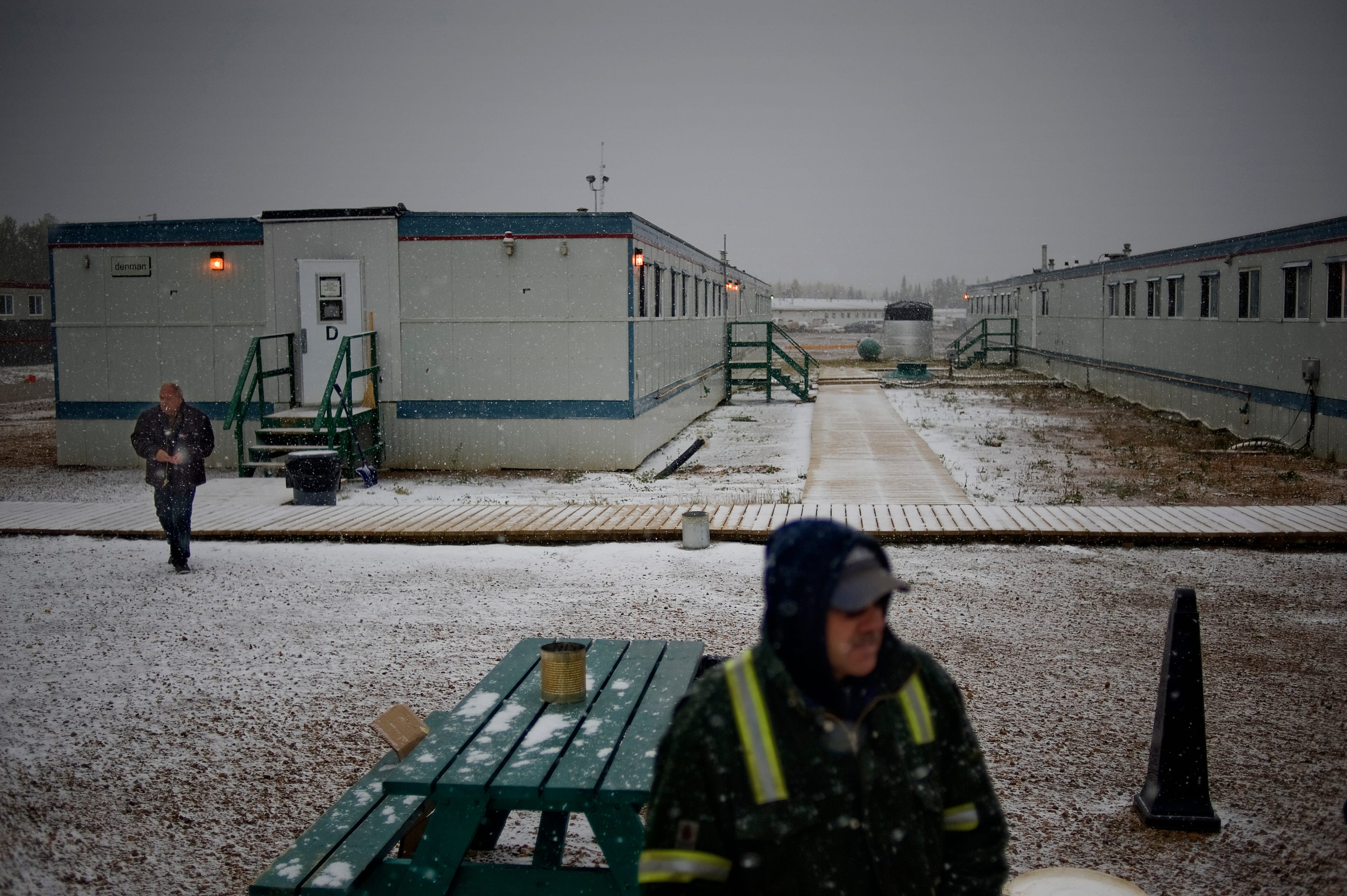The Eveready Worker Camp is one of the many worker camps that dot the landscape around the Oil Sands Developments. Some workers receive free lodging while others pay for the housing. They are given three meals a day, have an entertainment room and their own private rooms. Different camps offer different amenities and they can range in quality, expense and services that they offer. (Jon Lowenstein/NOOR/REDUX)