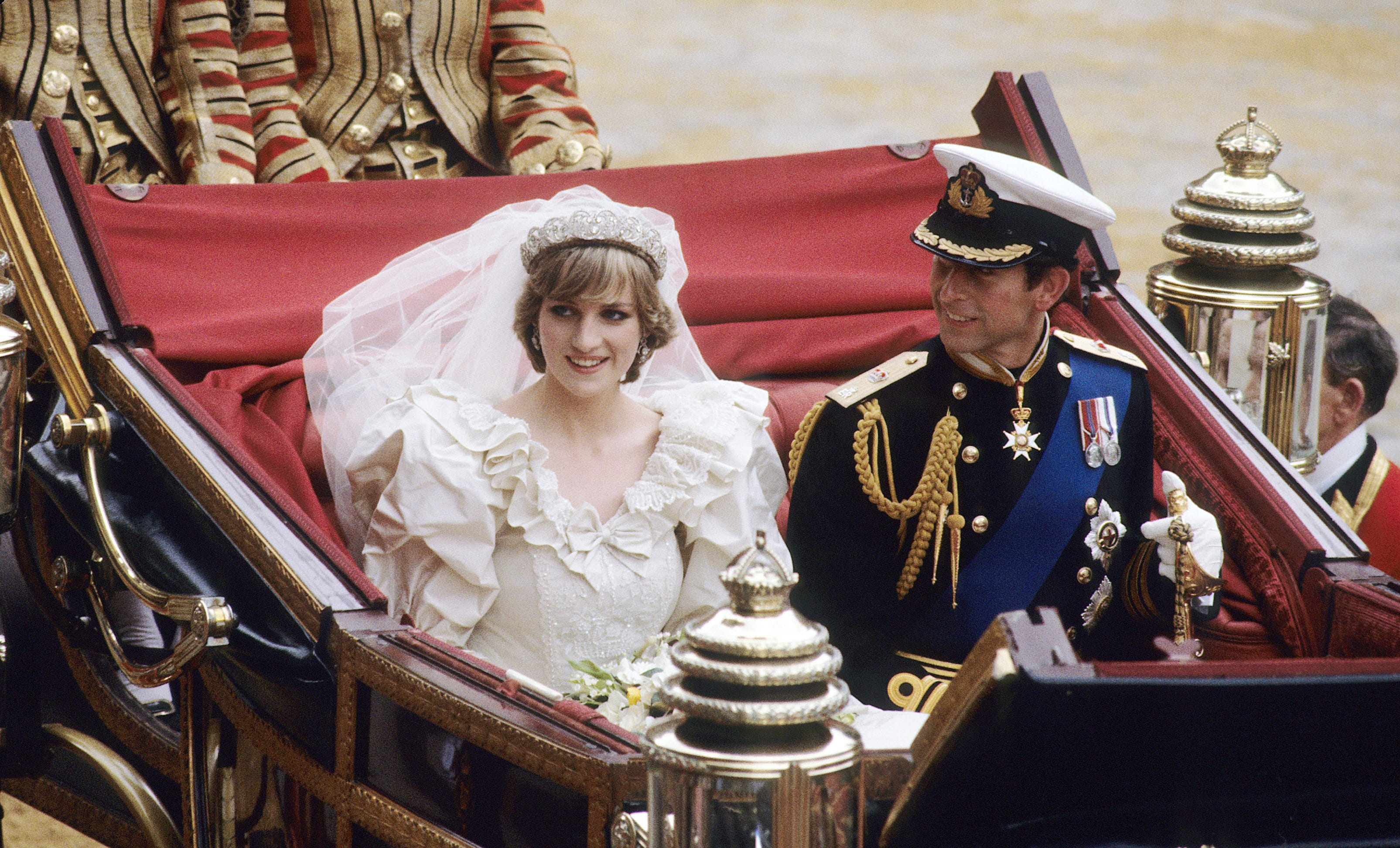 LONDON - JULY 29: Diana, Princess of Wales and Prince Charles ride in a carriage after their wedding at St. Paul's Cathedral July 29, 1981 in London, England.   (Photo by Anwar Hussein/WireImage)