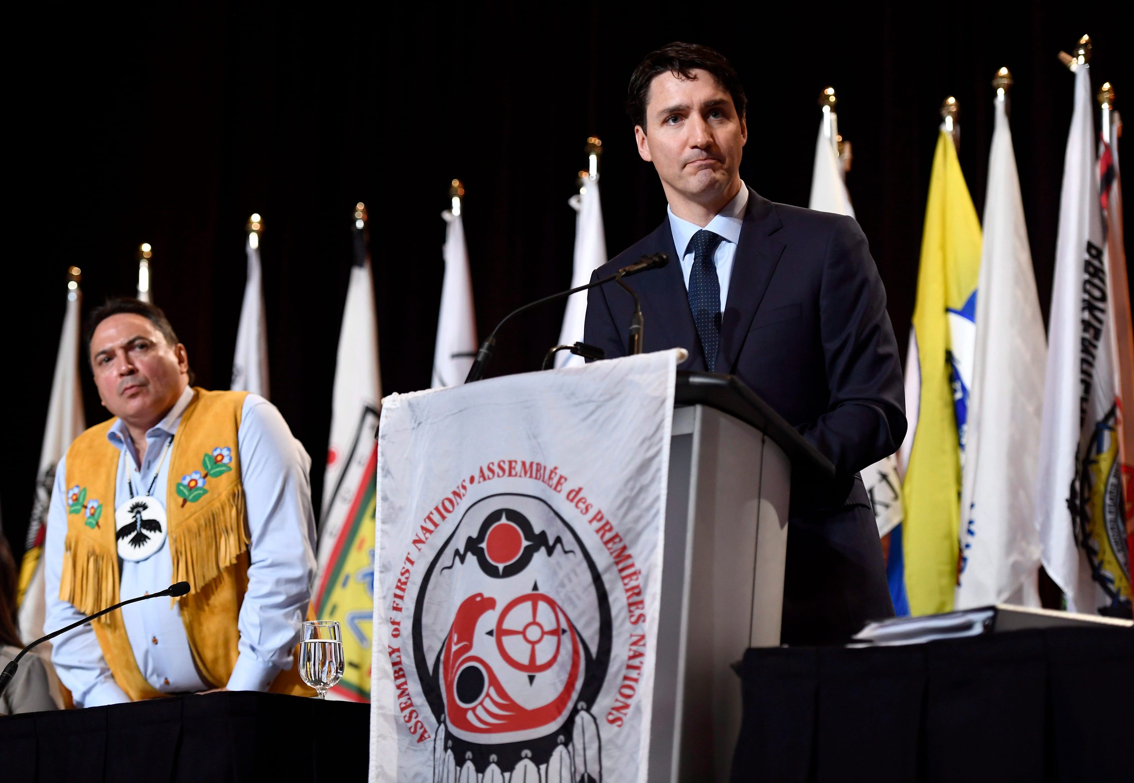 Prime Minister Justin Trudeau and AFN National Chief Perry Bellegarde listen to a question after the Prime Minister's address at the Assembly of First Nations Special Chiefs Assembly, in Gatineau, Que., on Wednesday, May 2, 2018. THE CANADIAN PRESS/Justin Tang