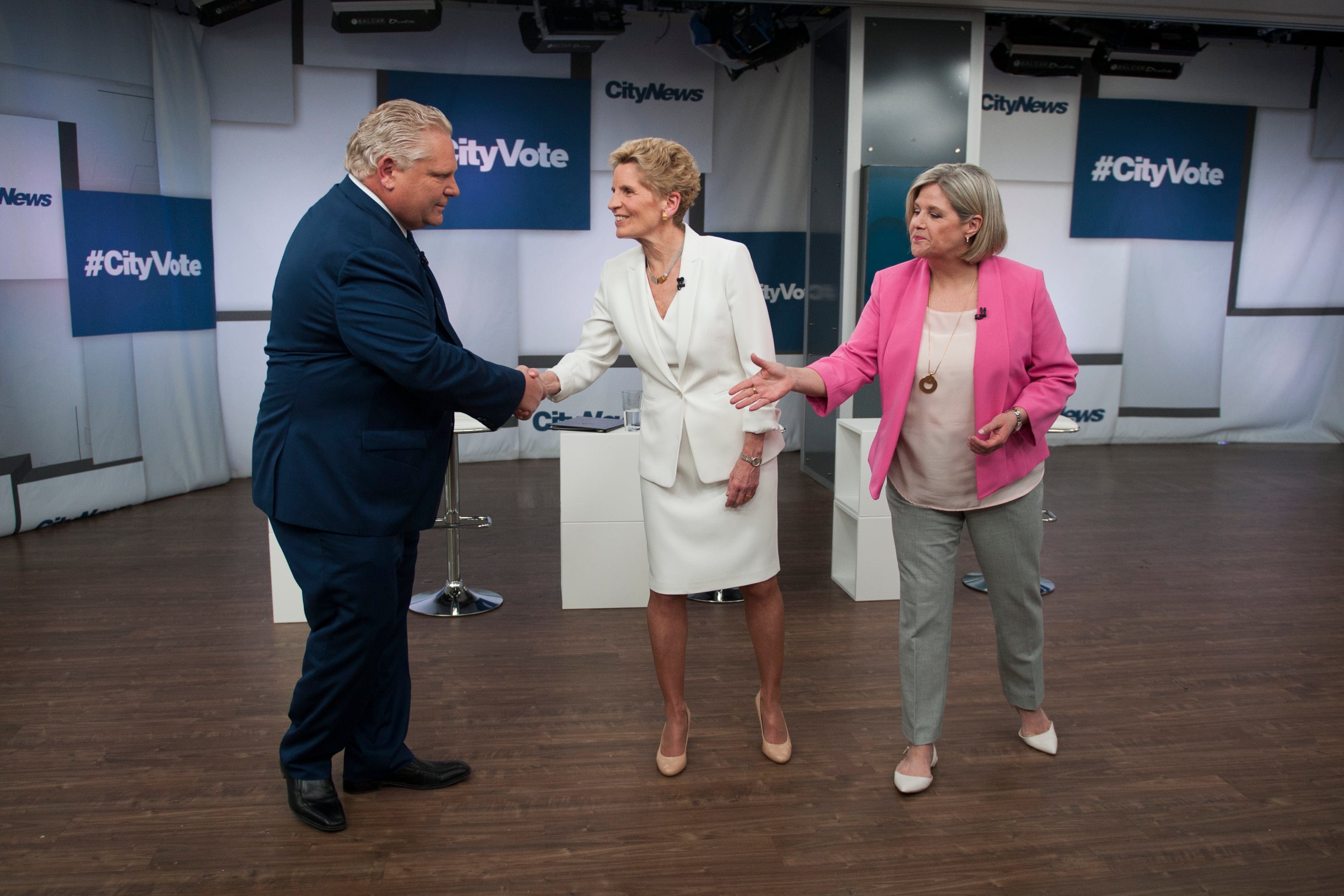 (L-R) Doug Ford, leader of the Progressive Conservative Party of Ontario, Kathleen Wynne, leader of the Ontario Liberal Party and Andrea Horwath, leader of the Ontario New Democratic Party shake hands at the end of the CityNews first televised debate ahead of this year's Ontario provincial election held at City studios on May 7, 2018 in Toronto. (Photograph by Marta Iwanek for Maclean's)