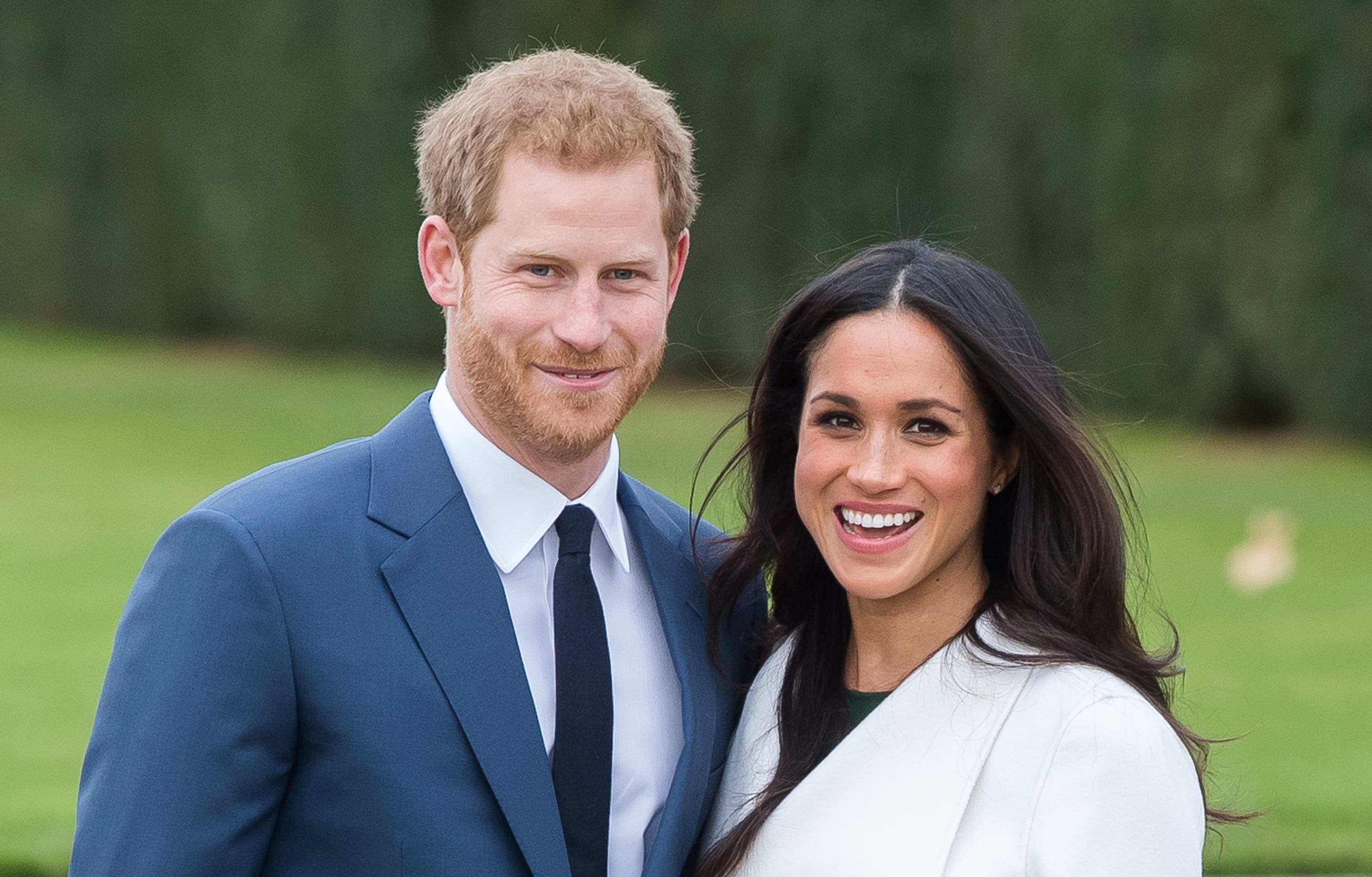 Prince Harry and Meghan Markle during an official photocall to announce the engagement of Prince Harry and actress Meghan Markle at The Sunken Gardens at Kensington Palace on November 27, 2017 in London, England.   (Photo by Samir Hussein/Samir Hussein/WireImage)