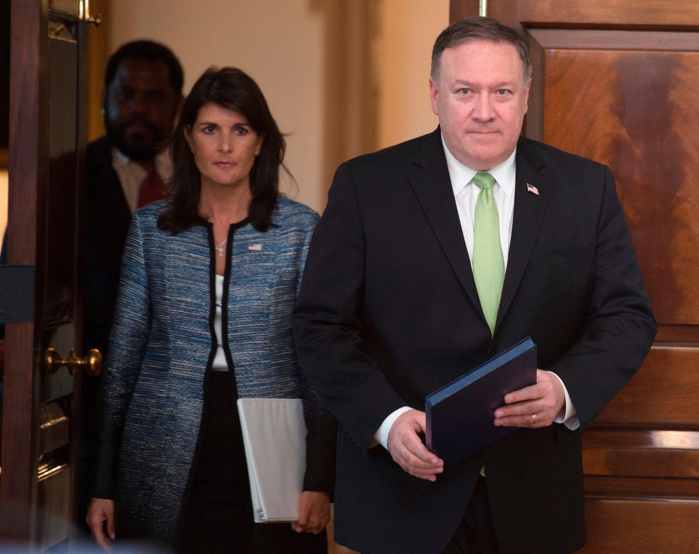US Secretary of State Mike Pompeo and US Ambassador to the United Nation Nikki Haley arrive at a press conference at the U.S. Department of State in Washington D.C. on June 19, 2018. The United States announced that it is withdrawing from the UN Human Rights Council. (ANDREW CABALLERO-REYNOLDS/AFP/Getty Images)