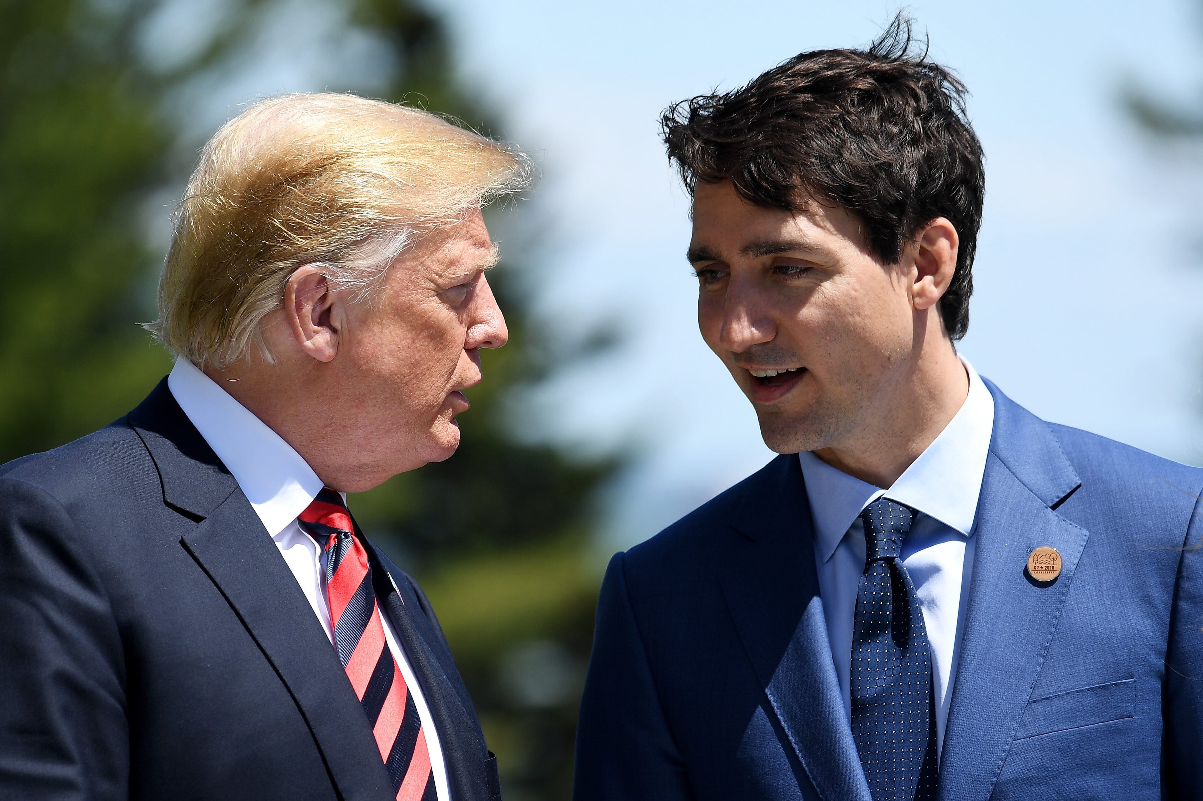 Prime Minister of Canada Justin Trudeau (right) speaks with U.S. President Donald Trump during the G7 official welcome at Le Manoir Richelieu on day one of the G7 meeting on June 8, 2018 in Quebec City, Canada. (Leon Neal/Getty Images)