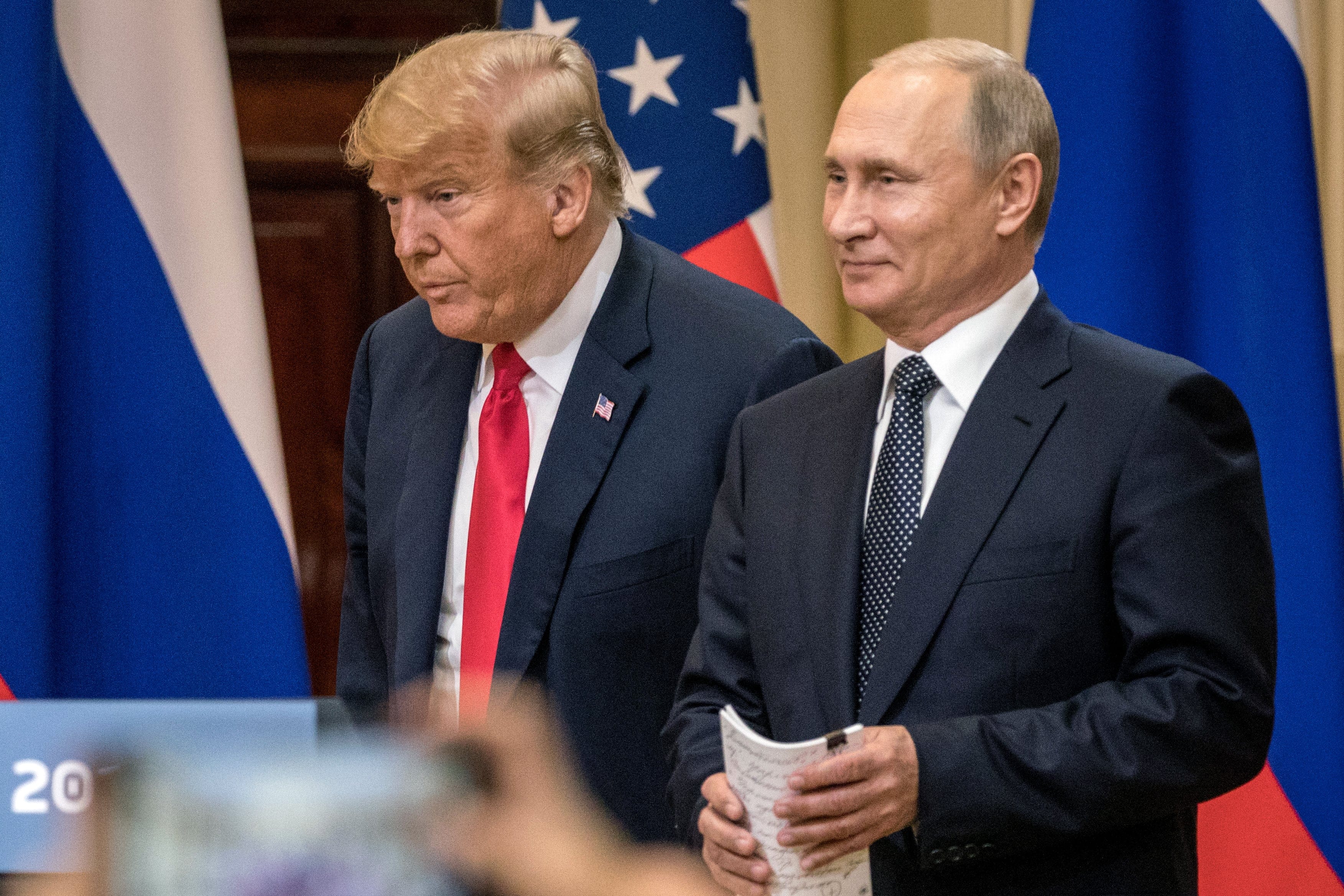 U.S. President Donald Trump and Russian President Vladimir Putin arrive to waiting media during a joint press conference after their summit on July 16, 2018 in Helsinki, Finland. (Chris McGrath/Getty Images)