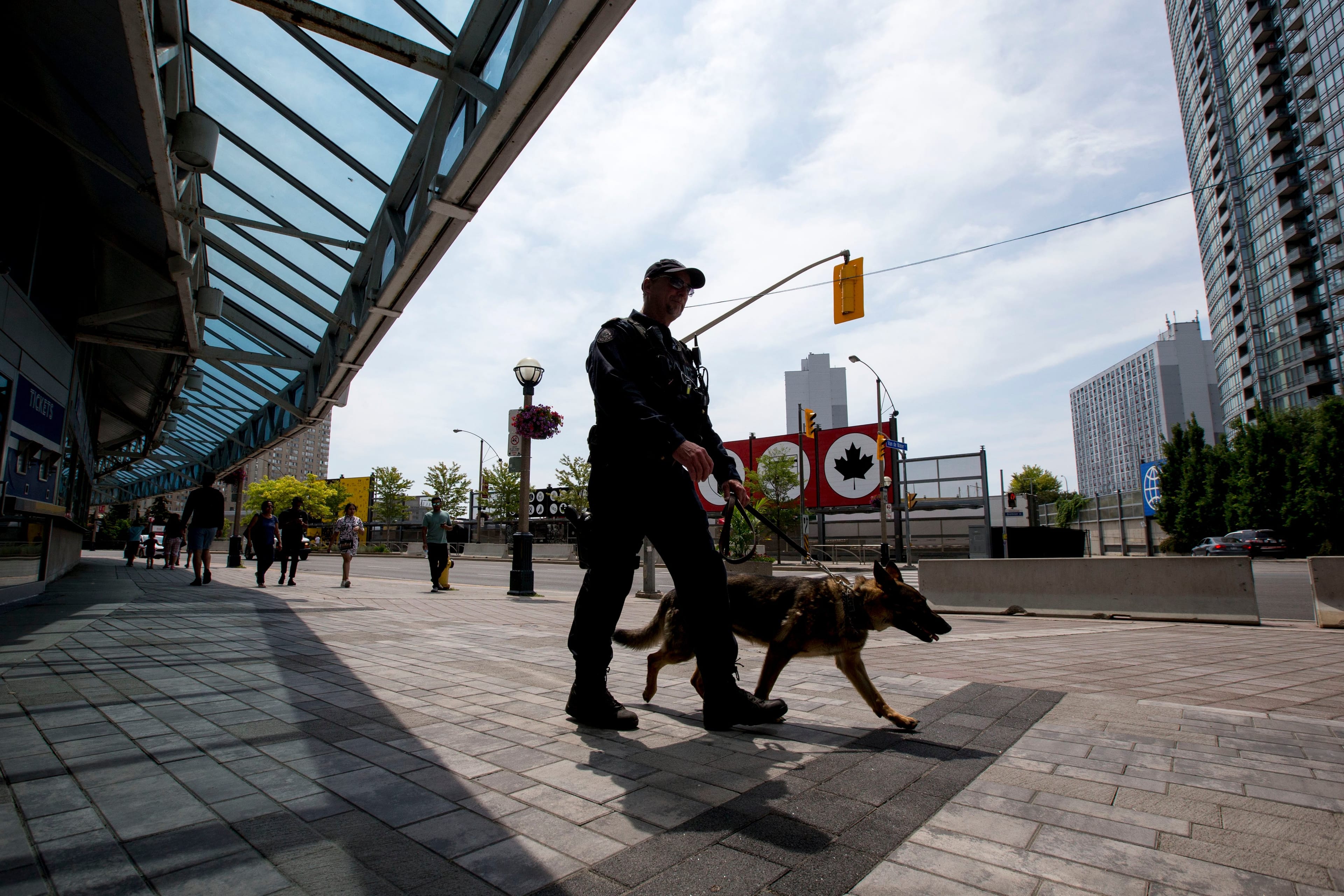Police officers at John St. and Front Street West on patrol, after Toronto Police Services increased police presence citing a "potential risk to public safety.' (Carlos Osorio/Toronto Star via Getty Images)