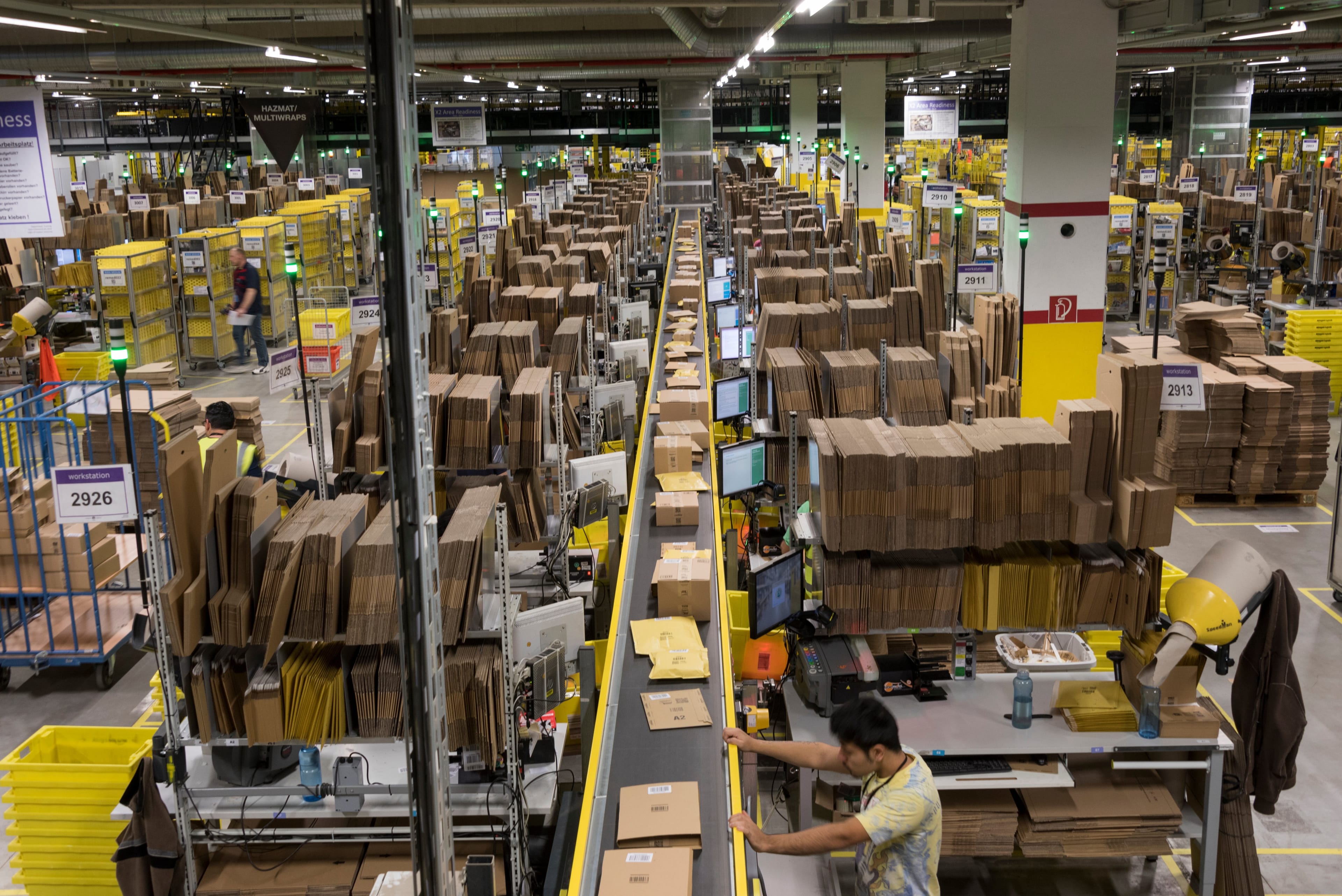 View of the packing section in Amazon logistics centre DUS2, a 110,000 sq.-metre plant established in 2011, in Rheinberg, Germany, December 2, 2014. (Horacio Villalobos/Corbis via Getty Images)
