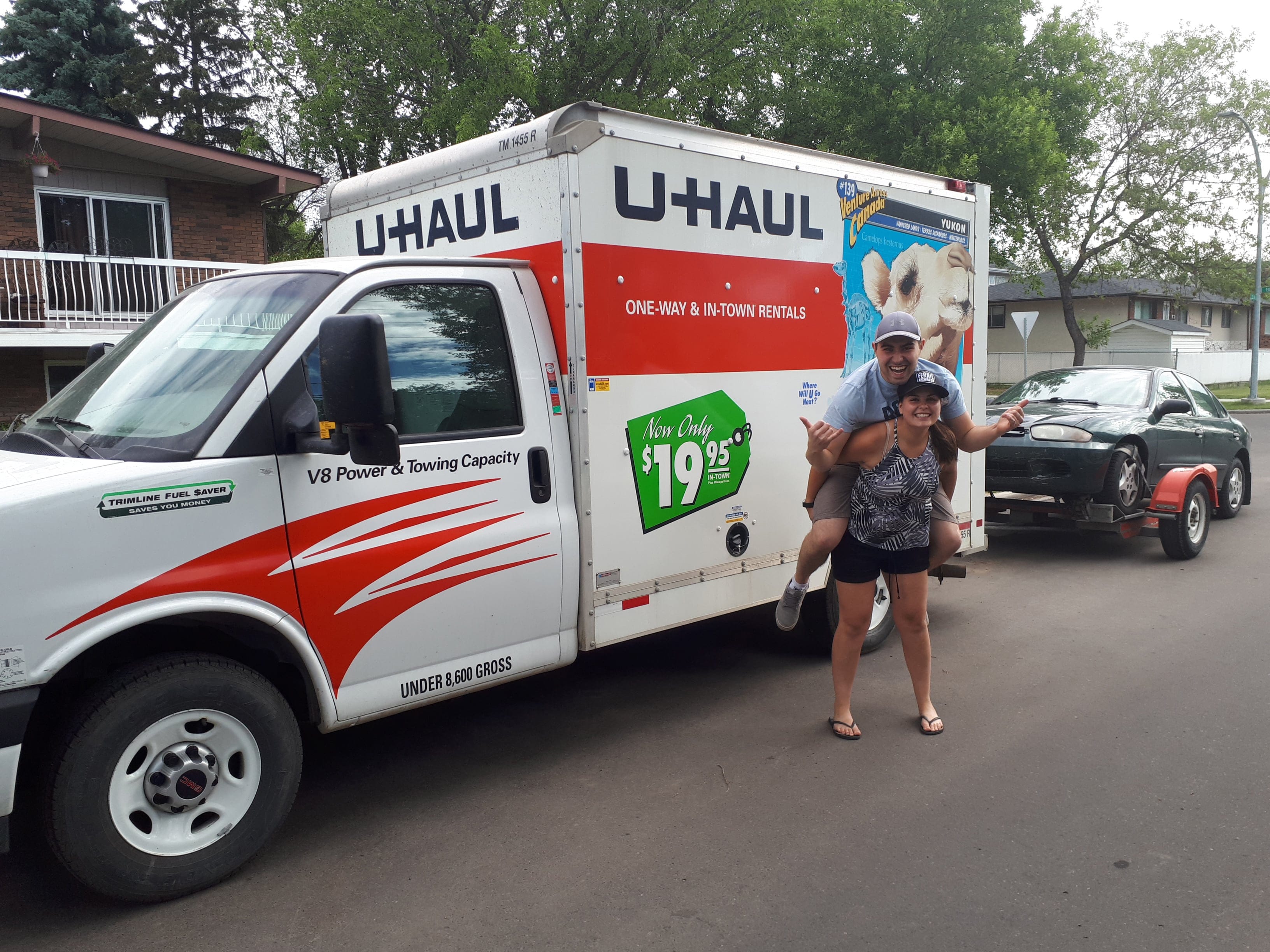 Christy and Jeff pose in front of their Uhaul before leaving Edmonton. (Christy Hawley)