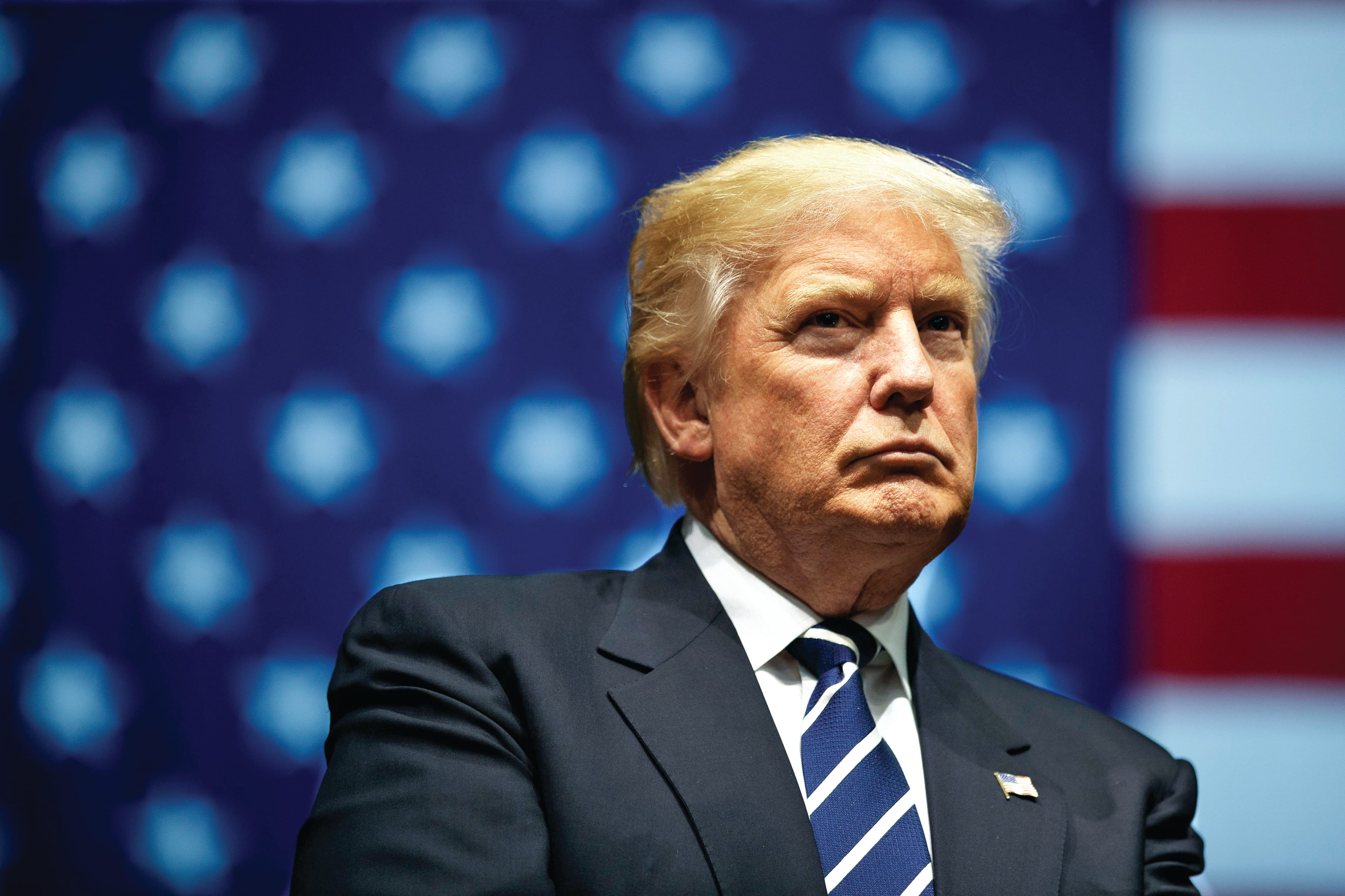 President-elect Donald Trump looks on during a rally at the DeltaPlex Arena, December 9, 2016 in Grand Rapids, Michigan. (Drew Angerer/Getty Images)