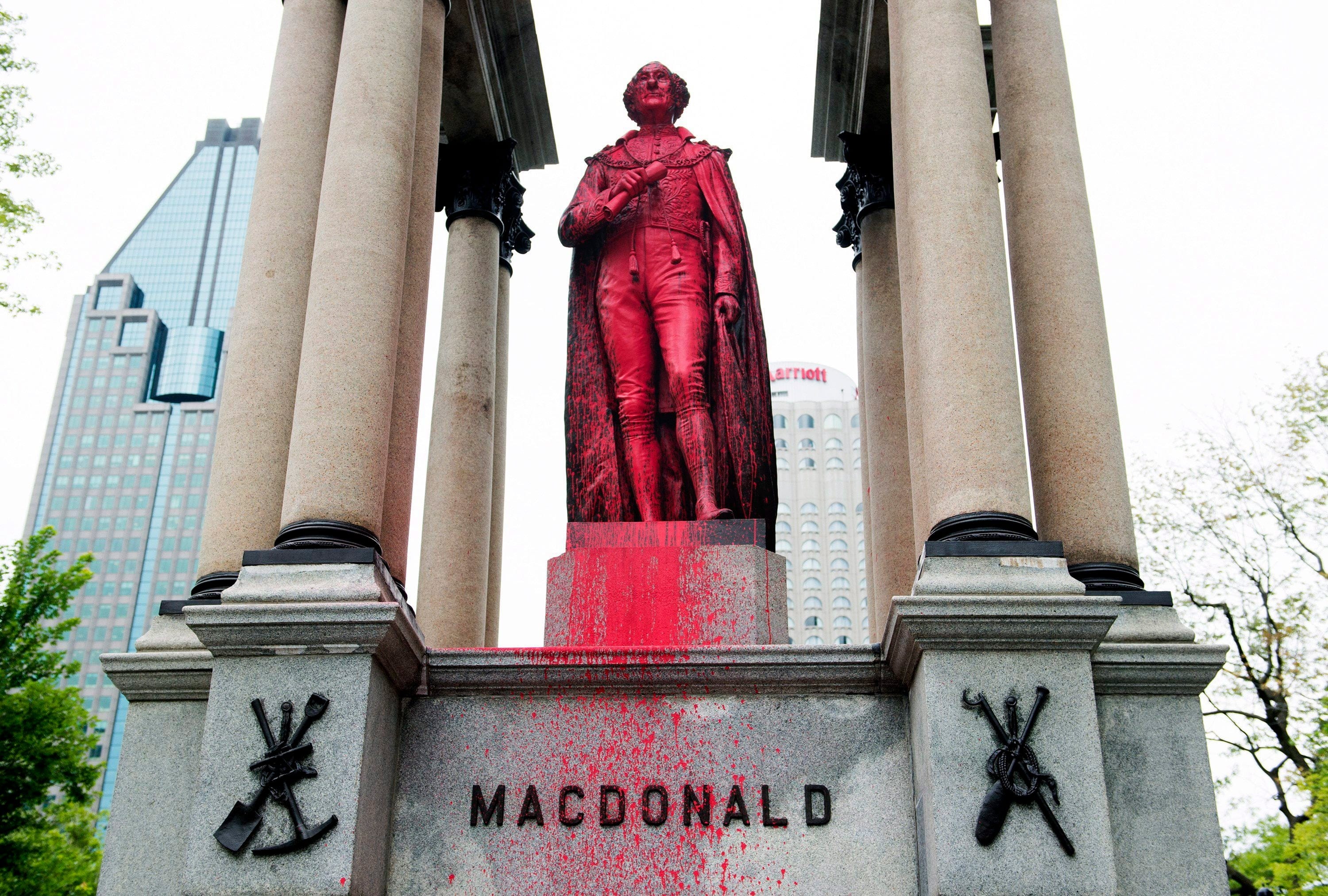 The statue of Sir John A. Macdonald is seen after being vandalized in Montreal, Friday, August 17, 2018. (Graham Hughes/CP)