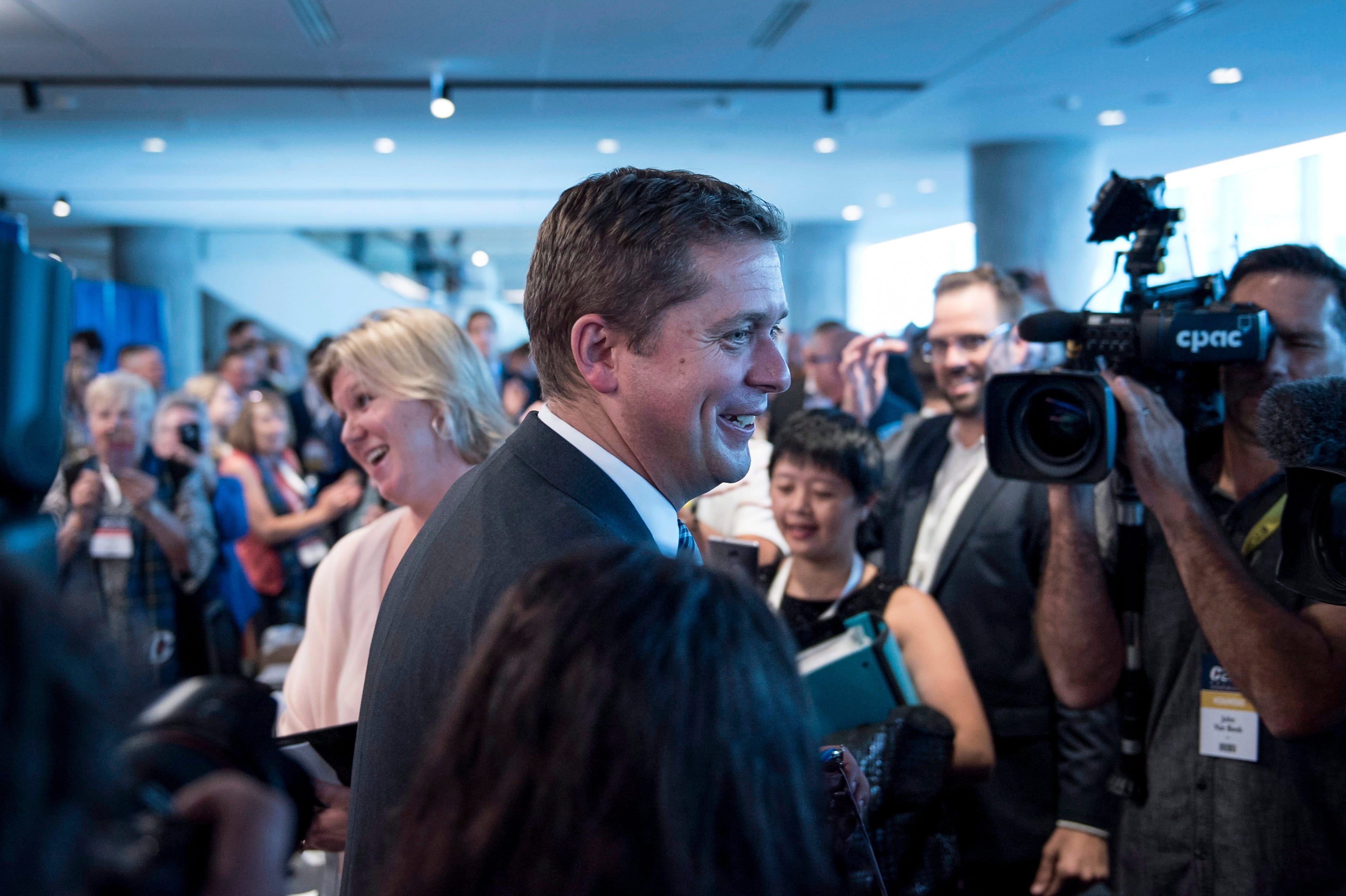 Conservative leader Andrew Scheer is greeted by supporters at the Party's national convention in Halifax on Thursday, August 23, 2018. THE CANADIAN PRESS/Darren Calabrese