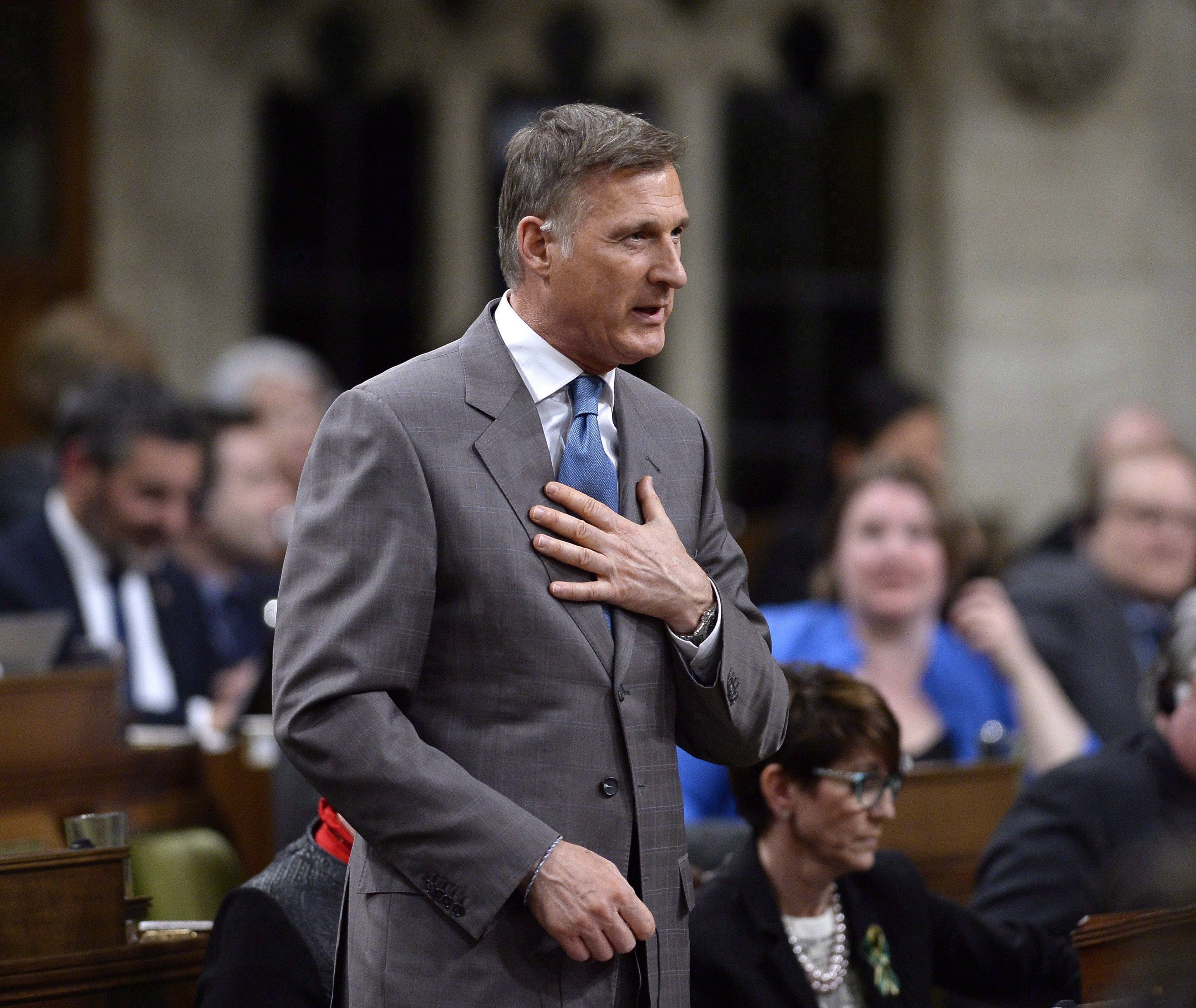 Conservative MP Maxime Bernier rises during Question Period in the House of Commons on Parliament Hill in Ottawa on Thursday, April 19, 2018. Aside from calling for an end to supply management in the dairy sector and privatizing Canada Post, the man dubbed "Mad Max" has a history of colourful, if not contentious, commentary. (THE CANADIAN PRESS/Justin Tang)