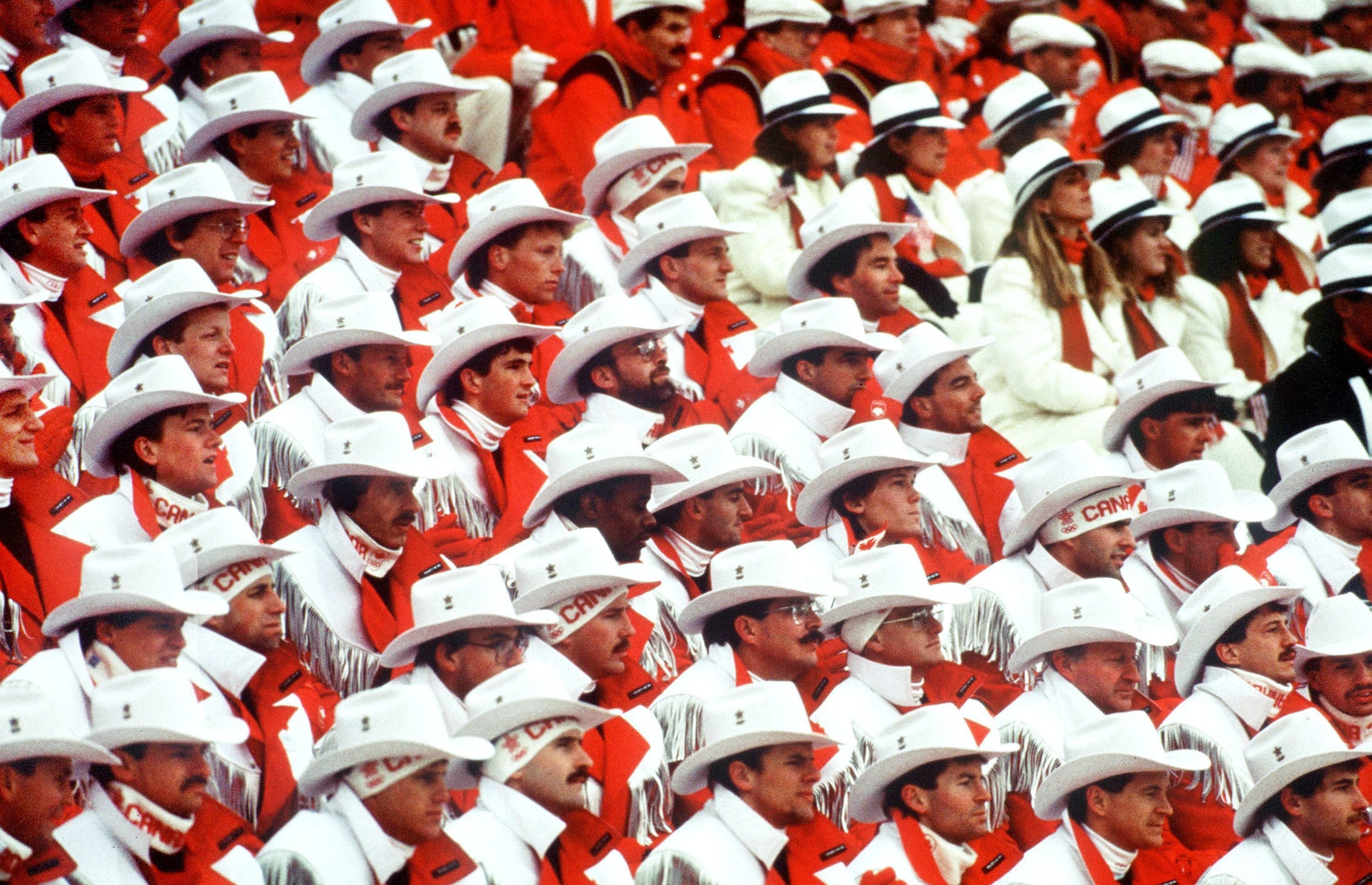 Canada's olympic athletes participating in the opening ceremonies at the 1988 Winter Olympics in Calgary. (CP PHOTO/COC/ Ted Grant)

Les athletes olympique lors des cérémonies d'ouverture des Jeux olympiques d' hiver de Calgary de 1988.  (PC Photo/AOC/Ted Grant)