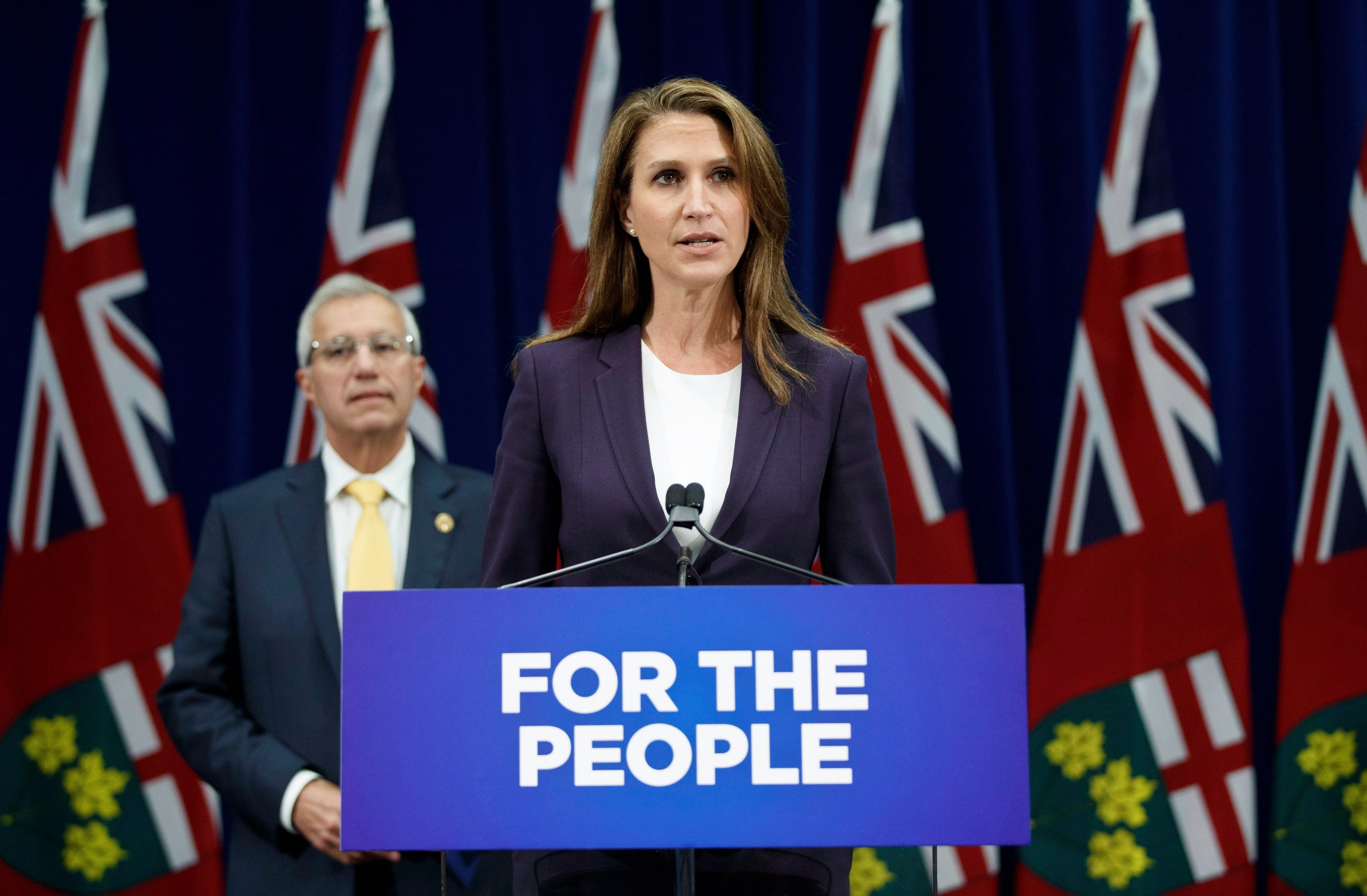 Ontario's Attorney General Caroline Mulroney and Minister of Finance Vic Fedeli speak about new legislation for selling marijuana, in Toronto, Wednesday September 26, 2018. THE CANADIAN PRESS/Mark Blinch