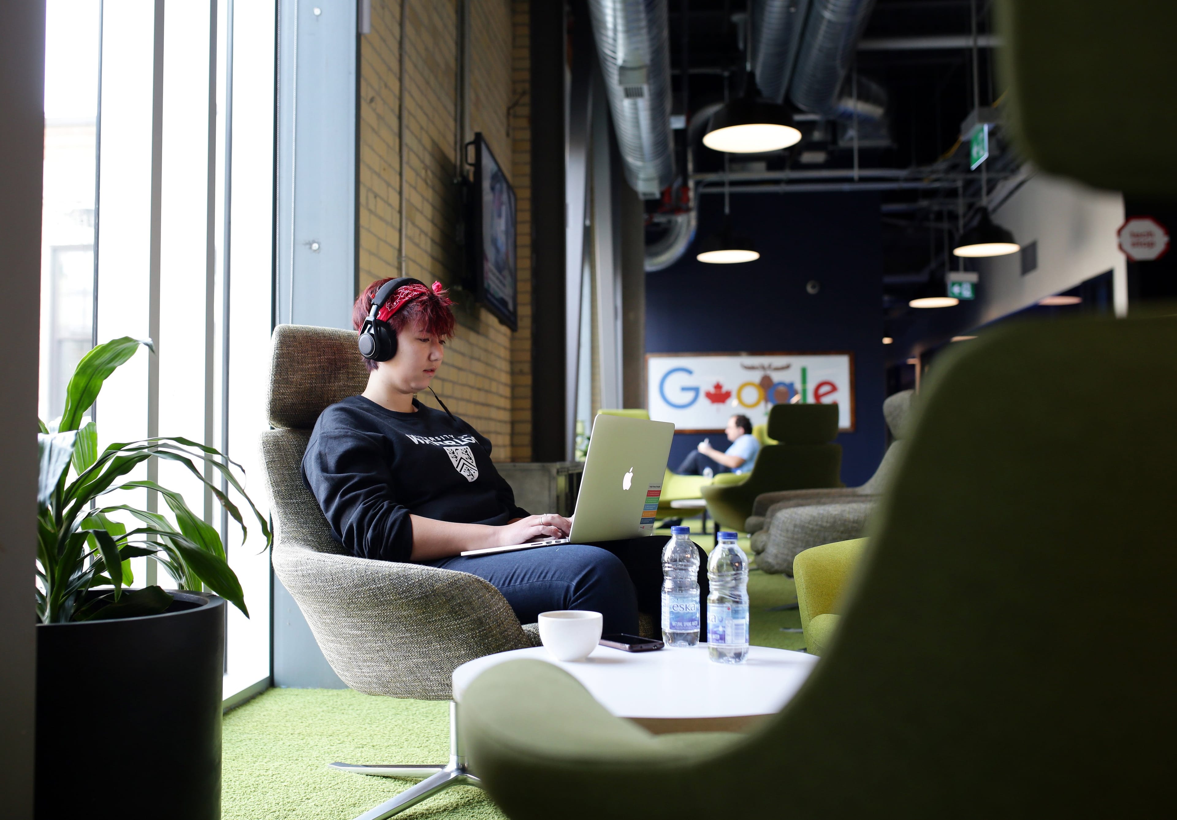 An employee works in a common area at Google Canada's engineering headquarters in Waterloo, Ont. (Cole Burston/Bloomberg /Getty Images)