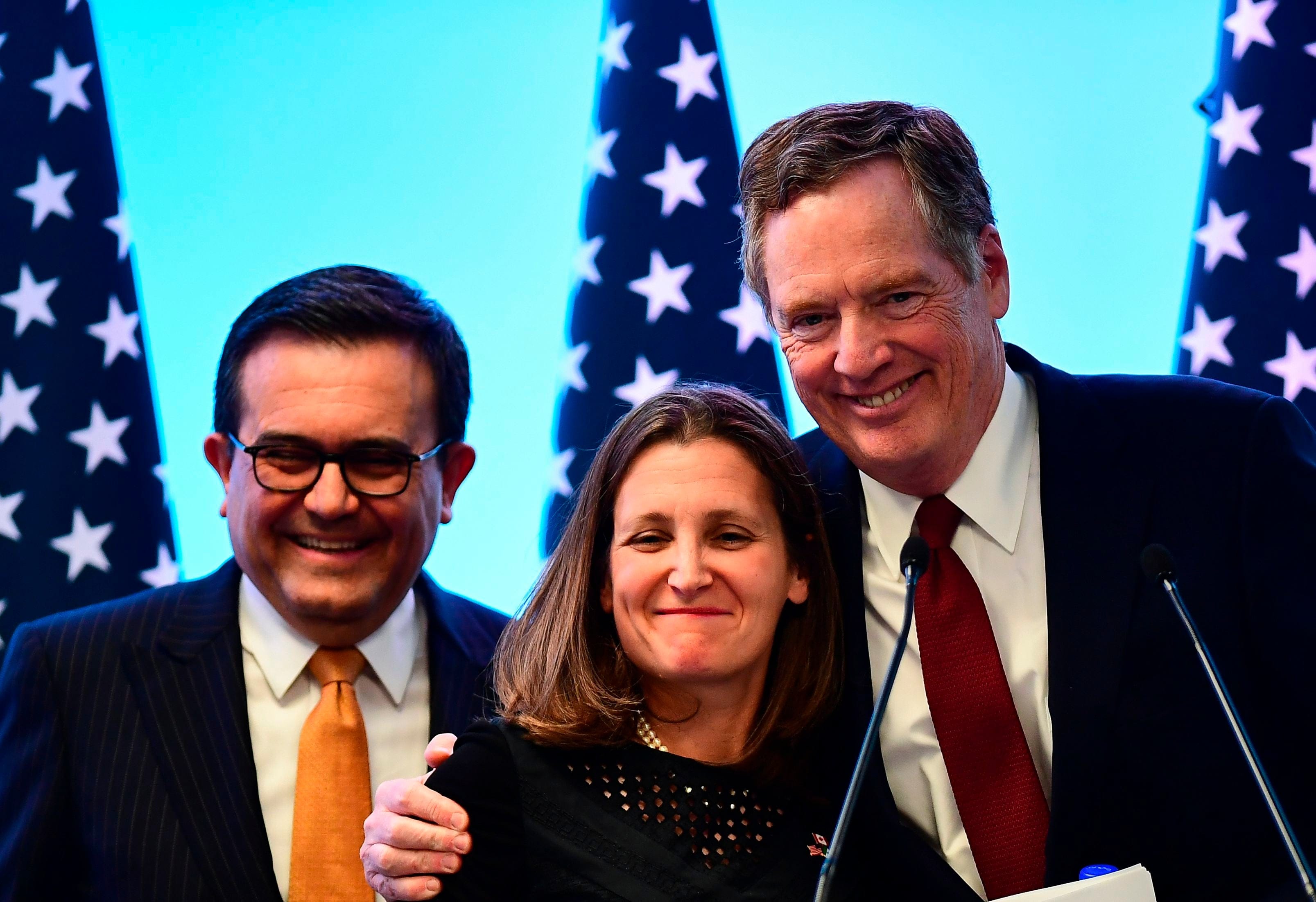 (L-R) Mexican Economy Minister Ildefonso Guajardo, Canadian Minister of Foreign Affairs Chrystia Freeland and U.S. Trade Representative Robert Lighthizer pose for pictures before giving a message to the media during the seventh round of NAFTA talks in Mexico City, on March 5, 2018. (Photo credit should read RONALDO SCHEMIDT/AFP/Getty Images)