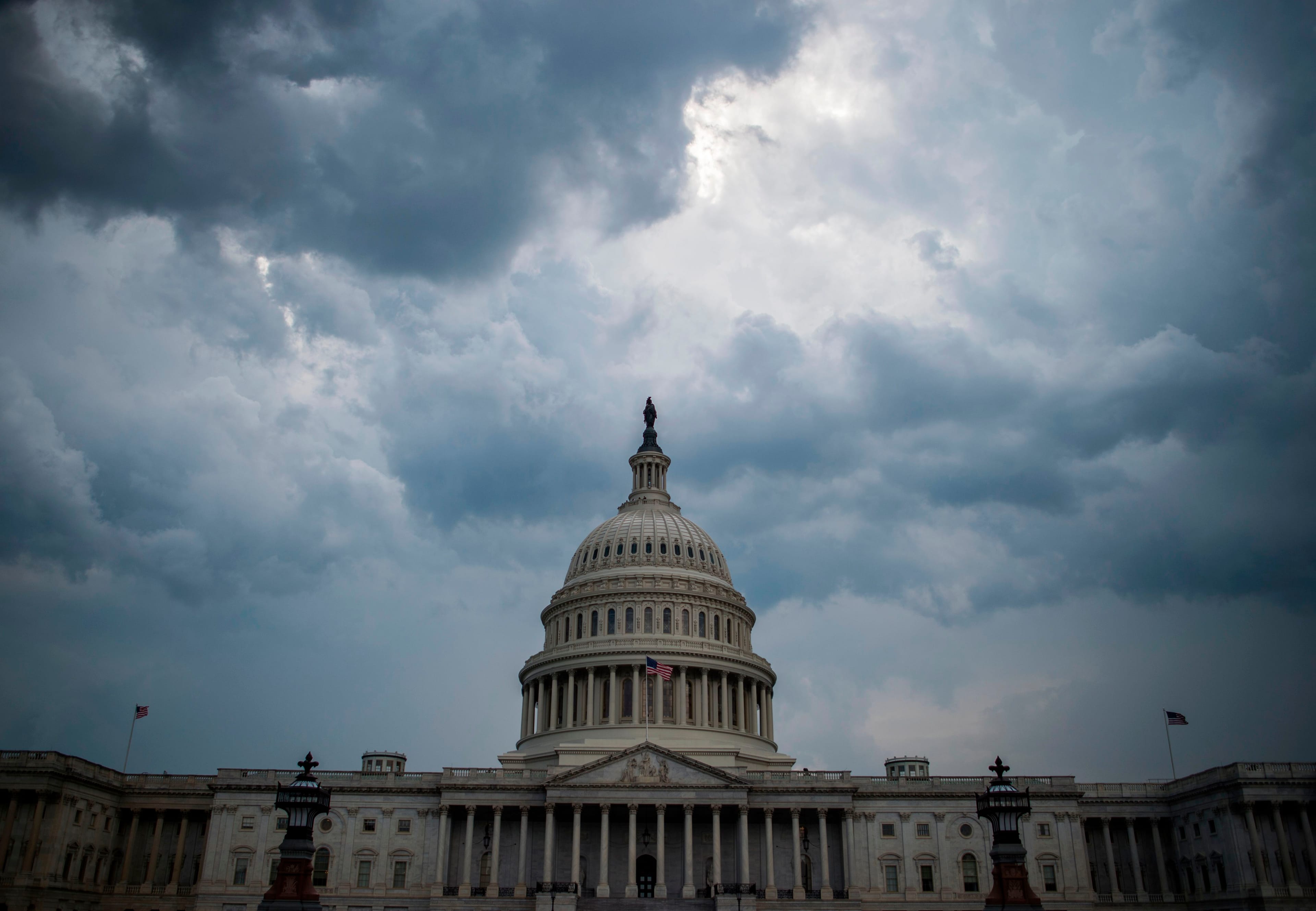 Storm clouds gather over Capitol Hill late in the day in Washington, DC on July 16, 2018. (Photo by ANDREW CABALLERO-REYNOLDS/AFP/Getty Images)