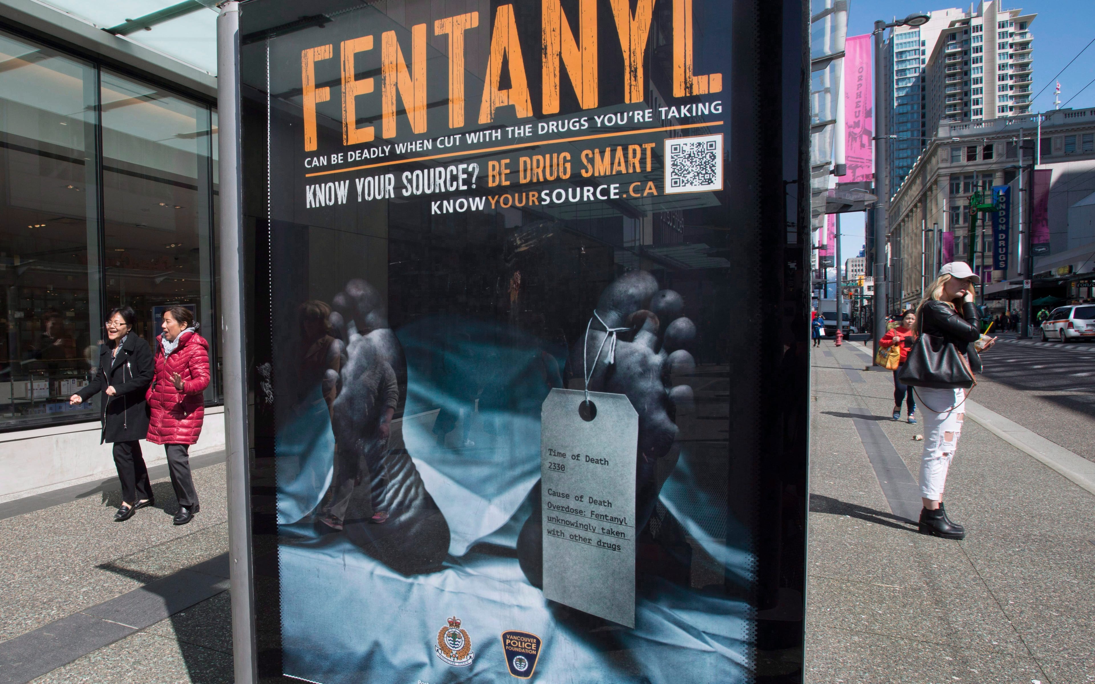 An anti-fentanyl advertisment is seen on a sidewalk in downtown Vancouver, Tuesday, April, 11, 2017. (Jonathan Hayward/CP)