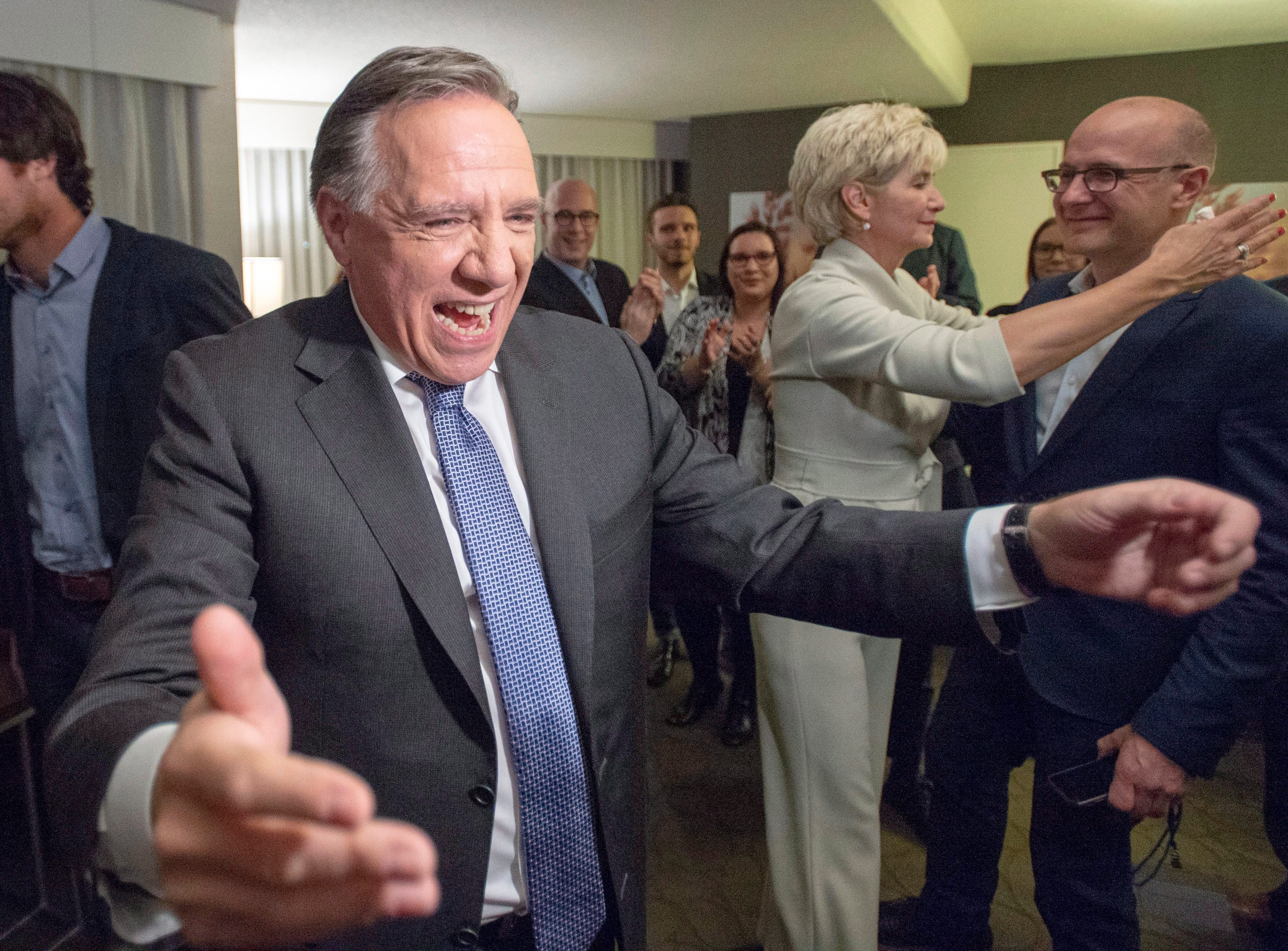 Coalition Avenir du Quebec leader Francois Legault celebrates while watching the results Monday, Oct. 1, 2018, in Quebec City, Que.(THE CANADIAN PRESS/Ryan Remiorz)