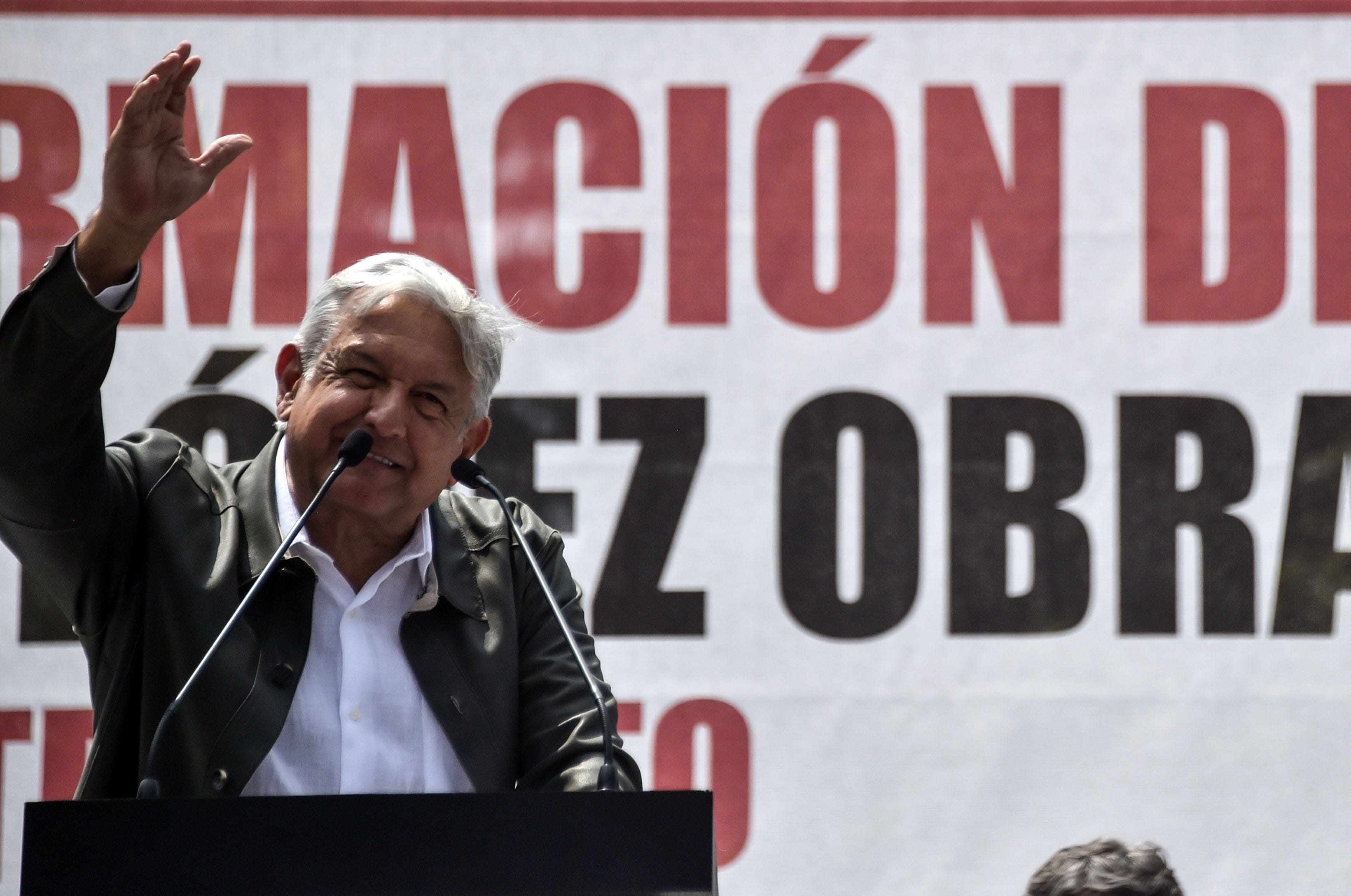 Mexican President-elect Andres Manuel Lopez Obrador waves to supporters during his national tour to thank those who voted for him in the July 1 elections, at the Plaza de las Tres Culturas in Mexico City, on September 29, 2018. (Rodrigo Arangua/AFP/Getty Images)