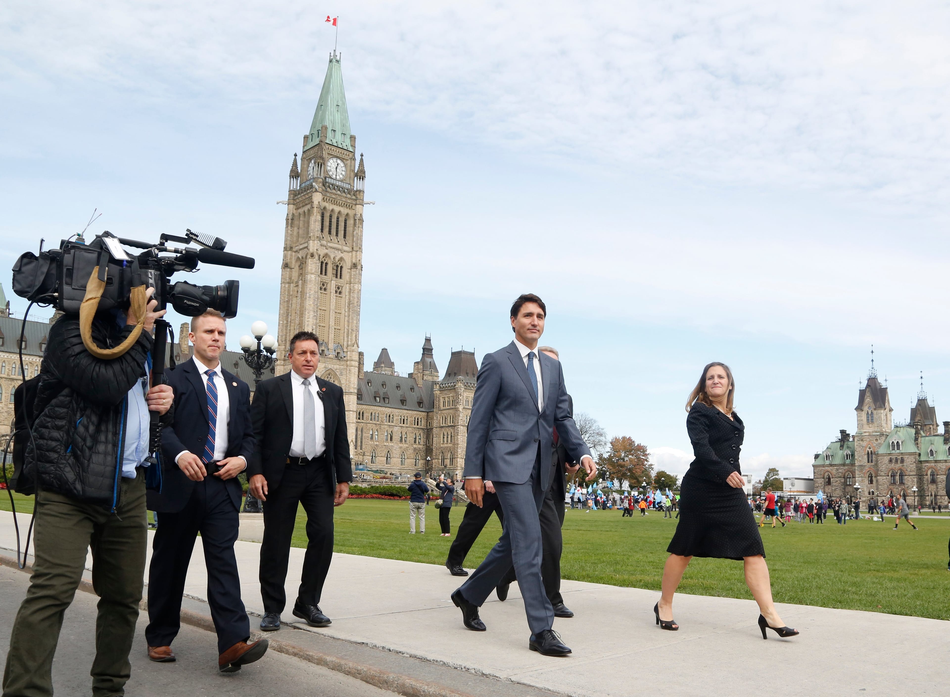 Canada's Prime Minister Justin Trudeau (left) and Minister of Foreign Affairs walk Chrystia Freeland walk to a press conference to announce the new trade pact with Canada, the United States, and Mexico in Ottawa, October 1, 2018. (Patrick Doyle/AFP/Getty Images)