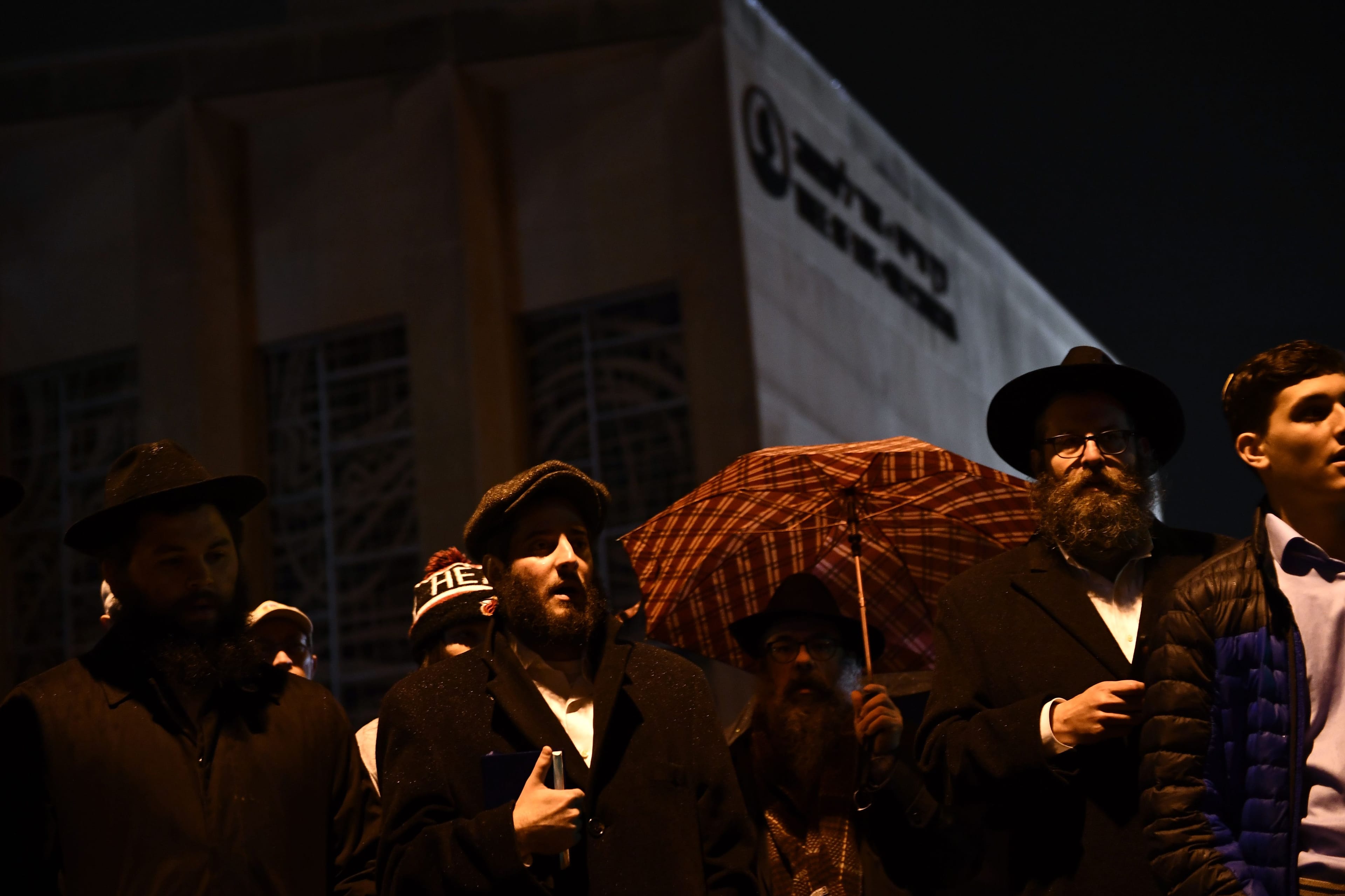 People gather outside the Tree of Life Synagogue after a shooting there left 11 people dead in the Squirrel Hill neighbourhood of Pittsburgh on October 27, 2018. (Brendan Smialowski / AFP/Getty Images)