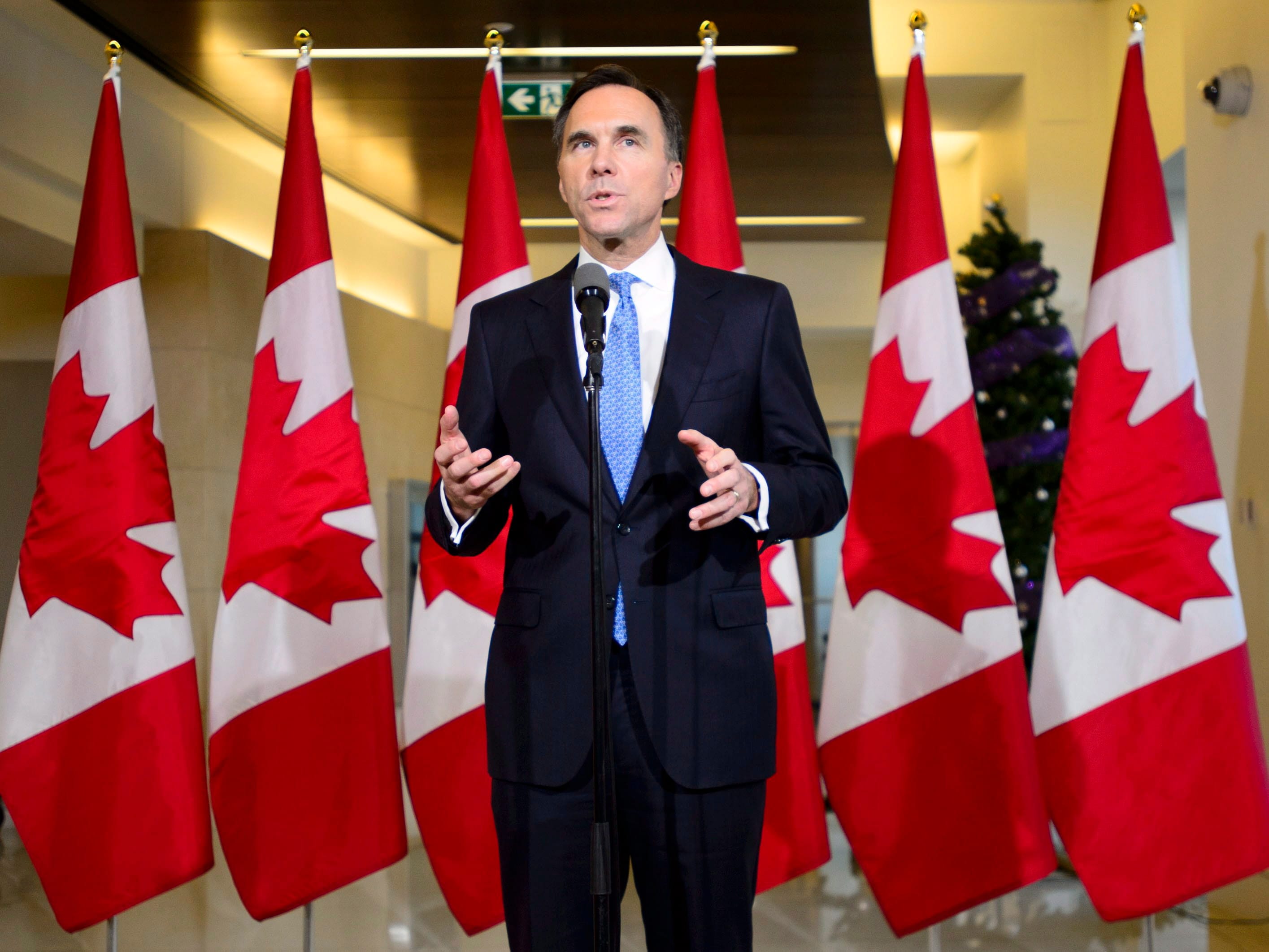Finance Minister Bill Morneau holds a press conference in the media lockup for the fall economic update, in Ottawa on Wednesday, Nov. 21, 2018. THE CANADIAN PRESS/Sean Kilpatrick