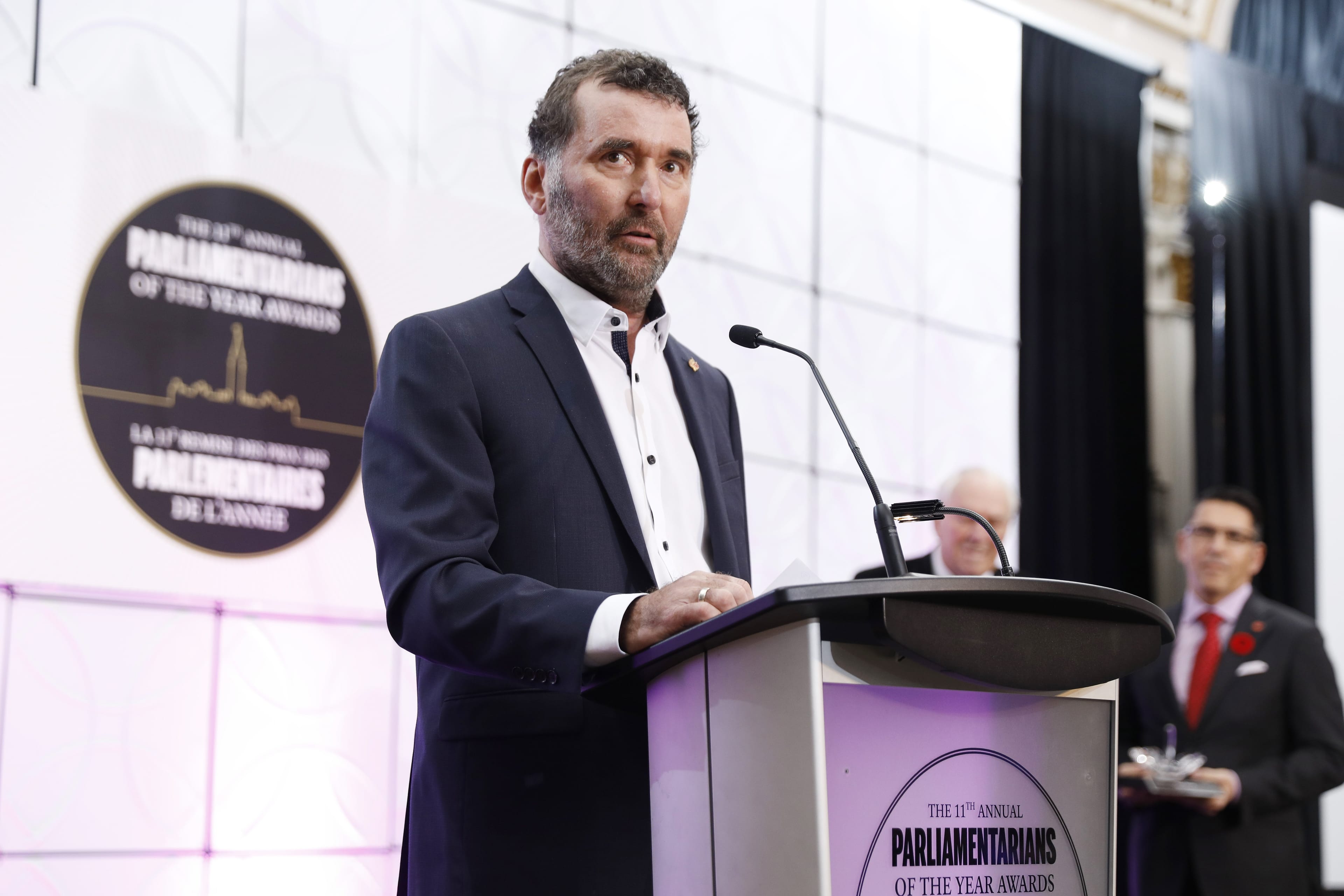 Lifetime Achievement award winner Paul Dewar shares remarks during the Parliamentarian of the Year awards at the Chateau Laurier in Ottawa, Nov. 5, 2018. (Blair Gable)